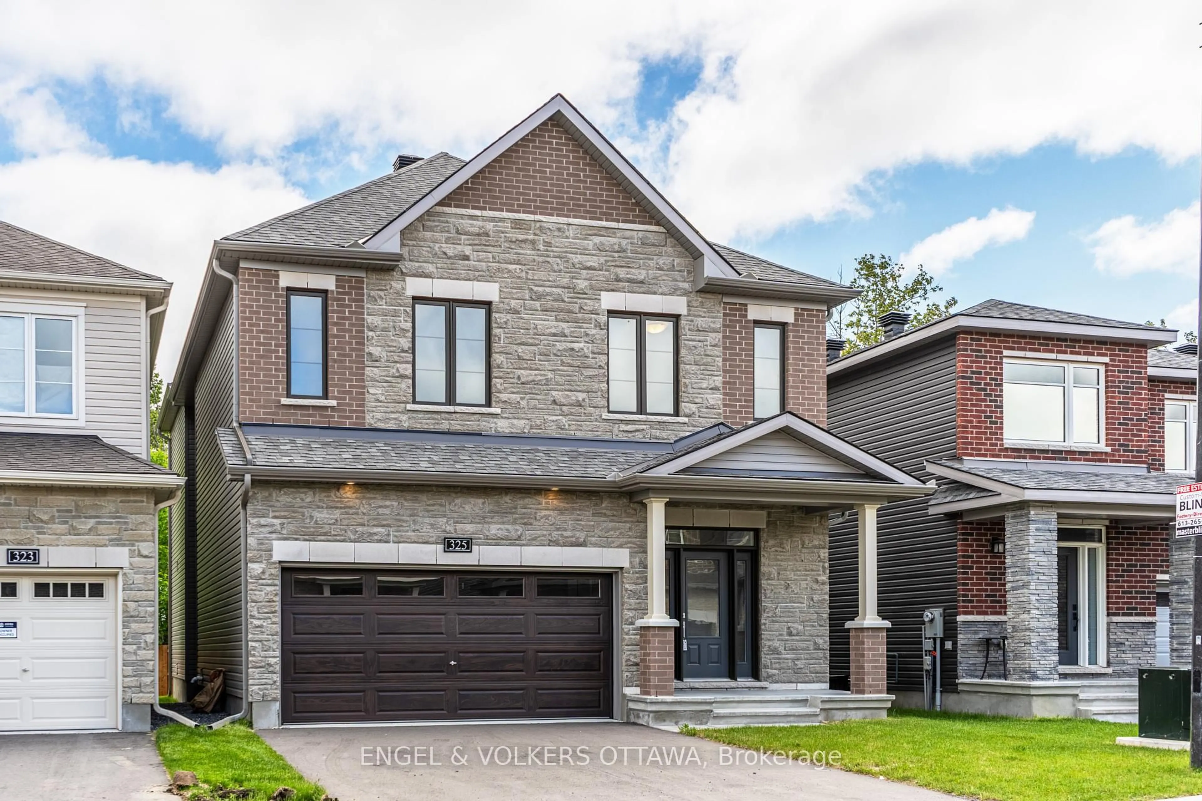 Home with brick exterior material, street for 325 Elsie Macgill Walk, Kanata Ontario K2W 0K7