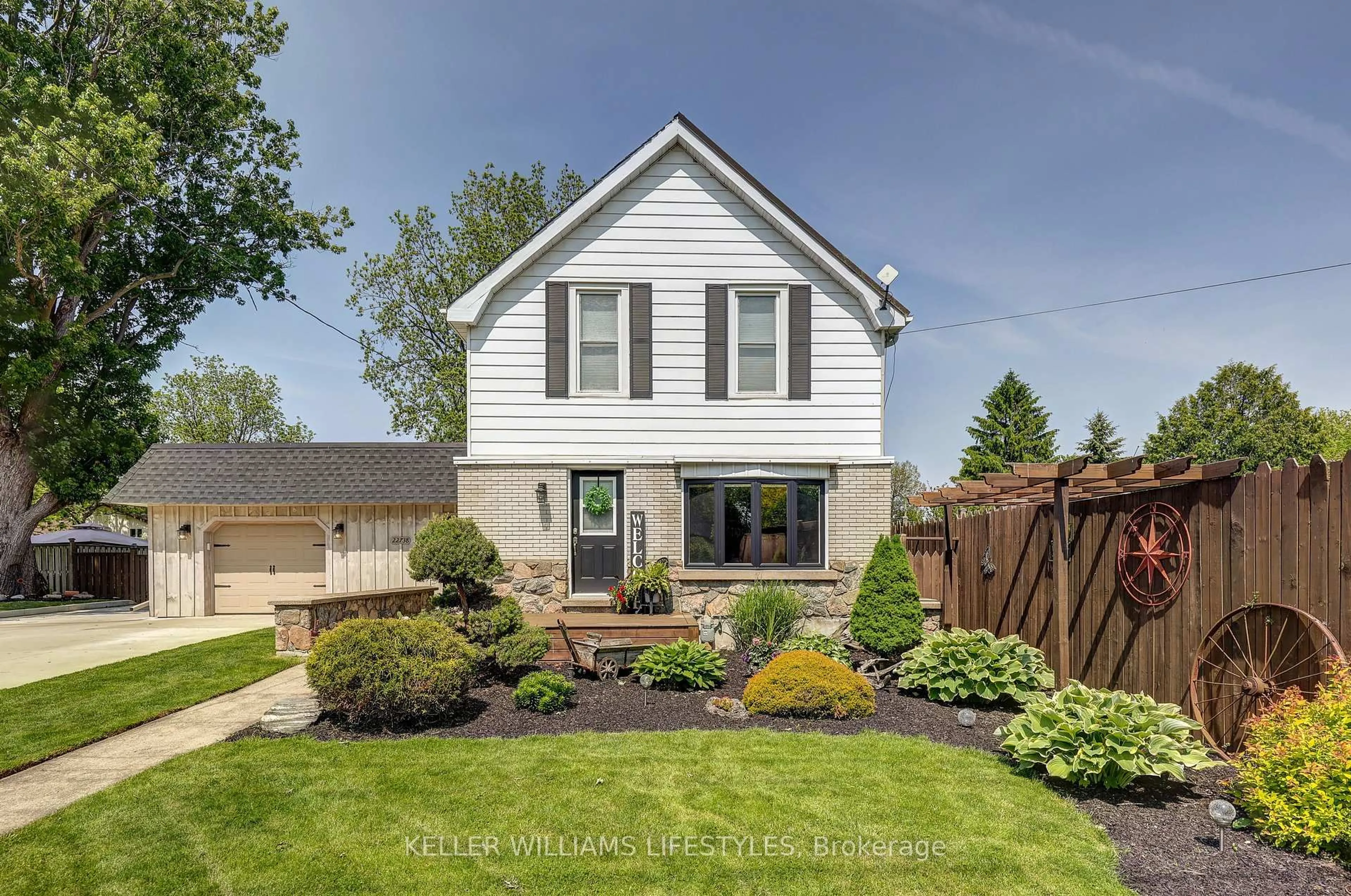 Home with vinyl exterior material, street for 22738 Thames Rd, Southwest Middlesex Ontario N0L 1A0