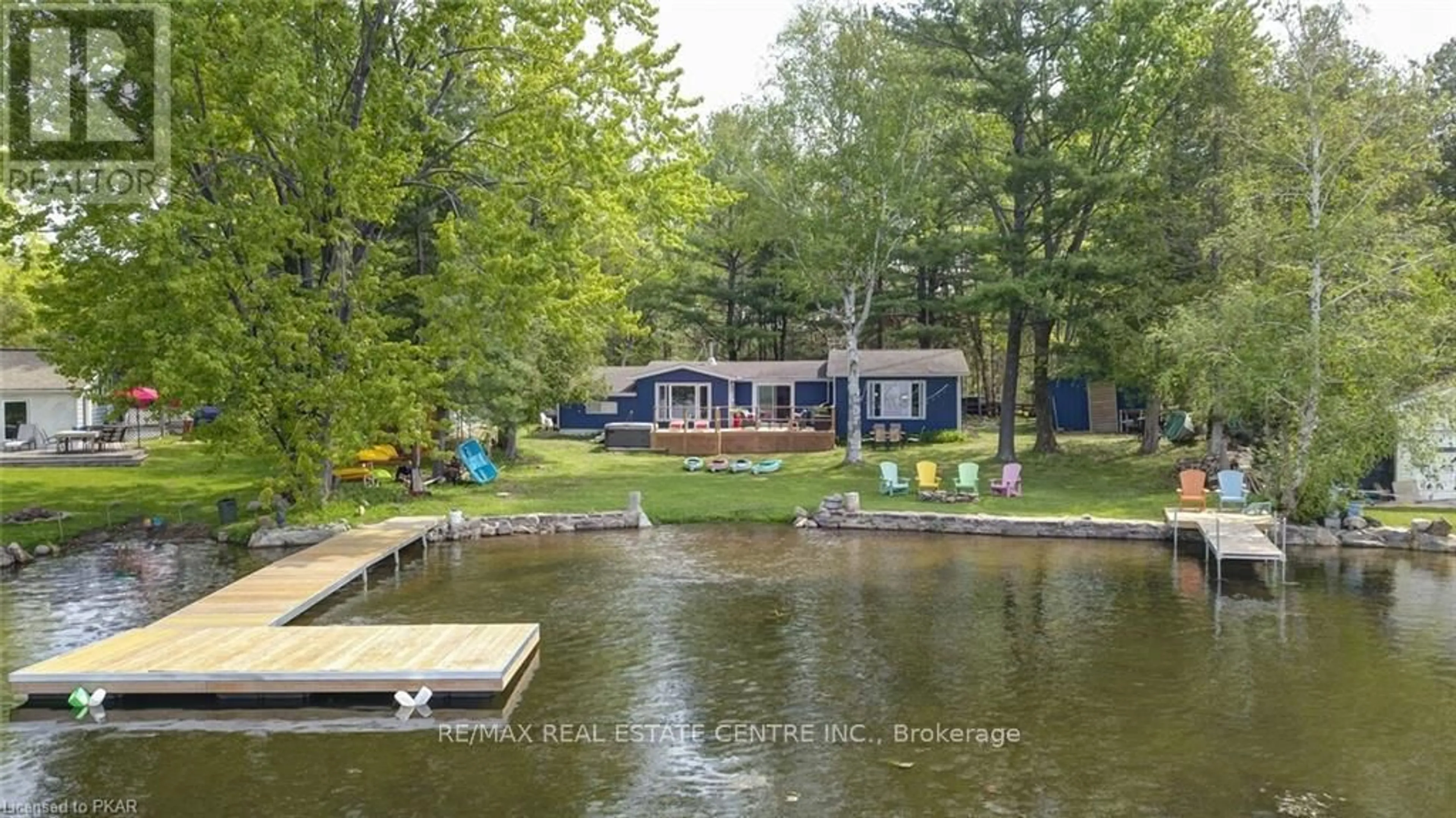 A pic from outside/outdoor area/front of a property/back of a property/a pic from drone, water/lake/river/ocean view for 3012 Greenwood Lane, Selwyn Ontario K0L 2H0