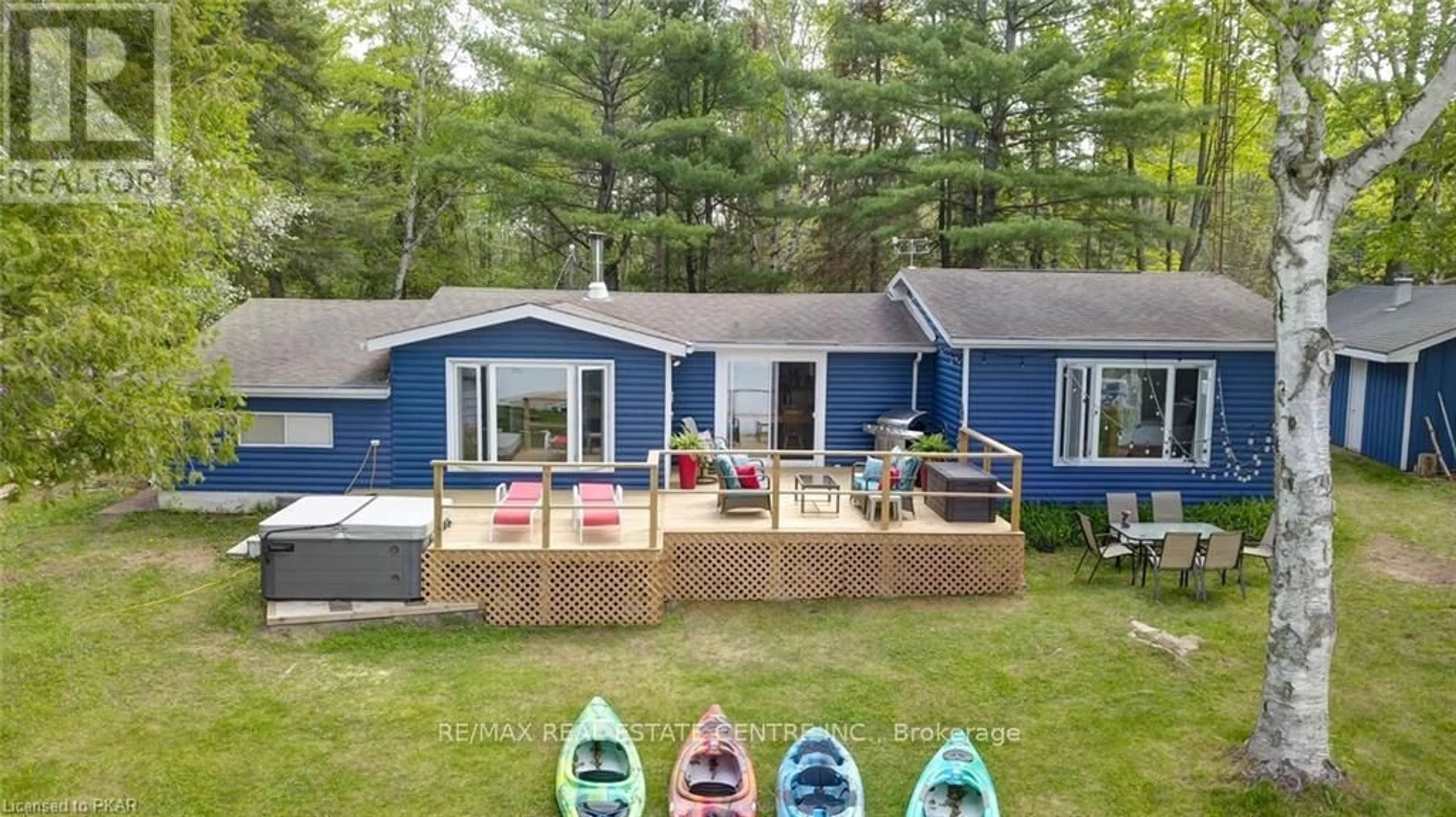 A pic from outside/outdoor area/front of a property/back of a property/a pic from drone, water/lake/river/ocean view for 3012 Greenwood Lane, Selwyn Ontario K0L 2H0