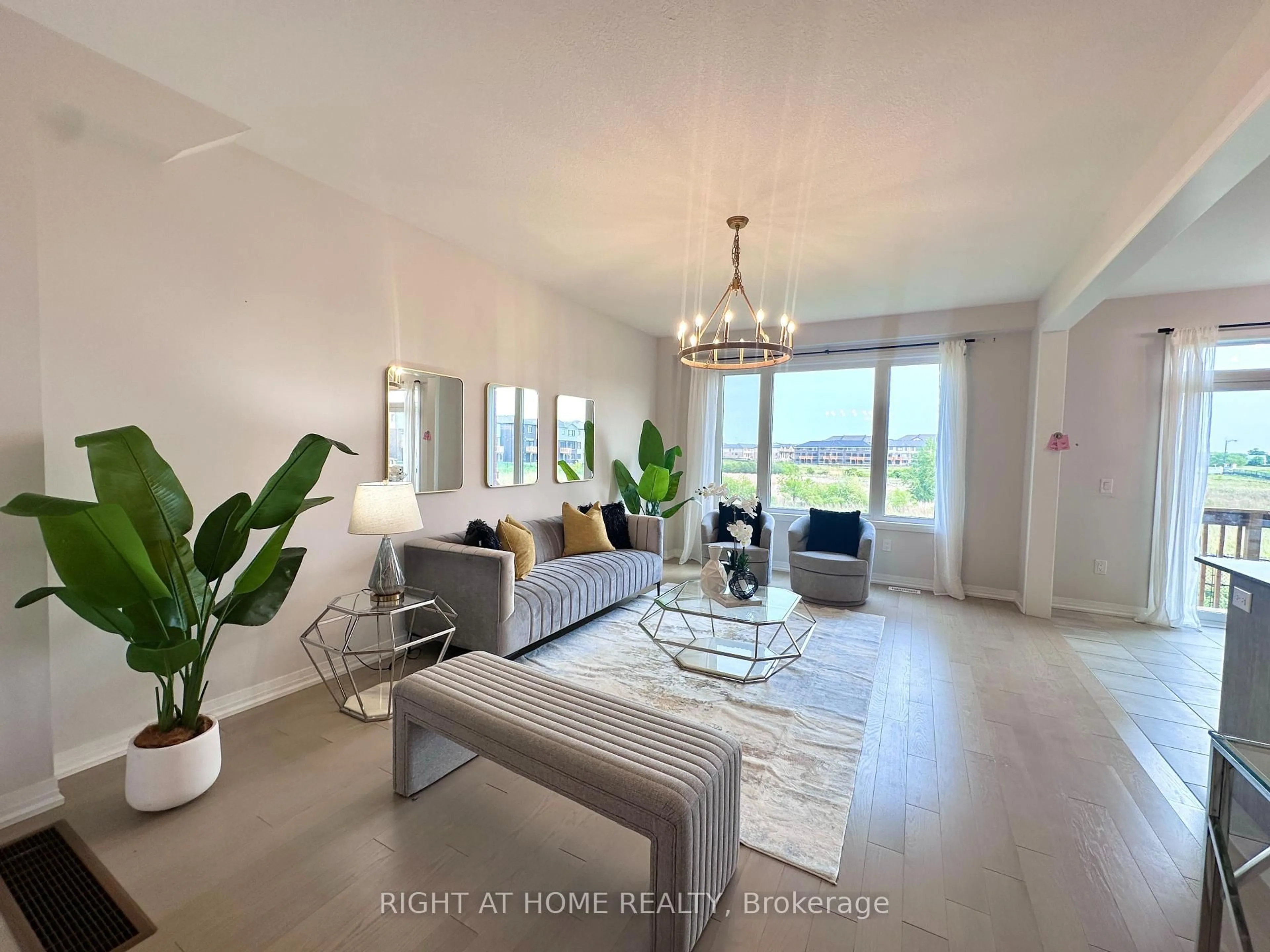 Living room with furniture, wood/laminate floor for 27 Blackburn St, Cambridge Ontario N1S 0E1