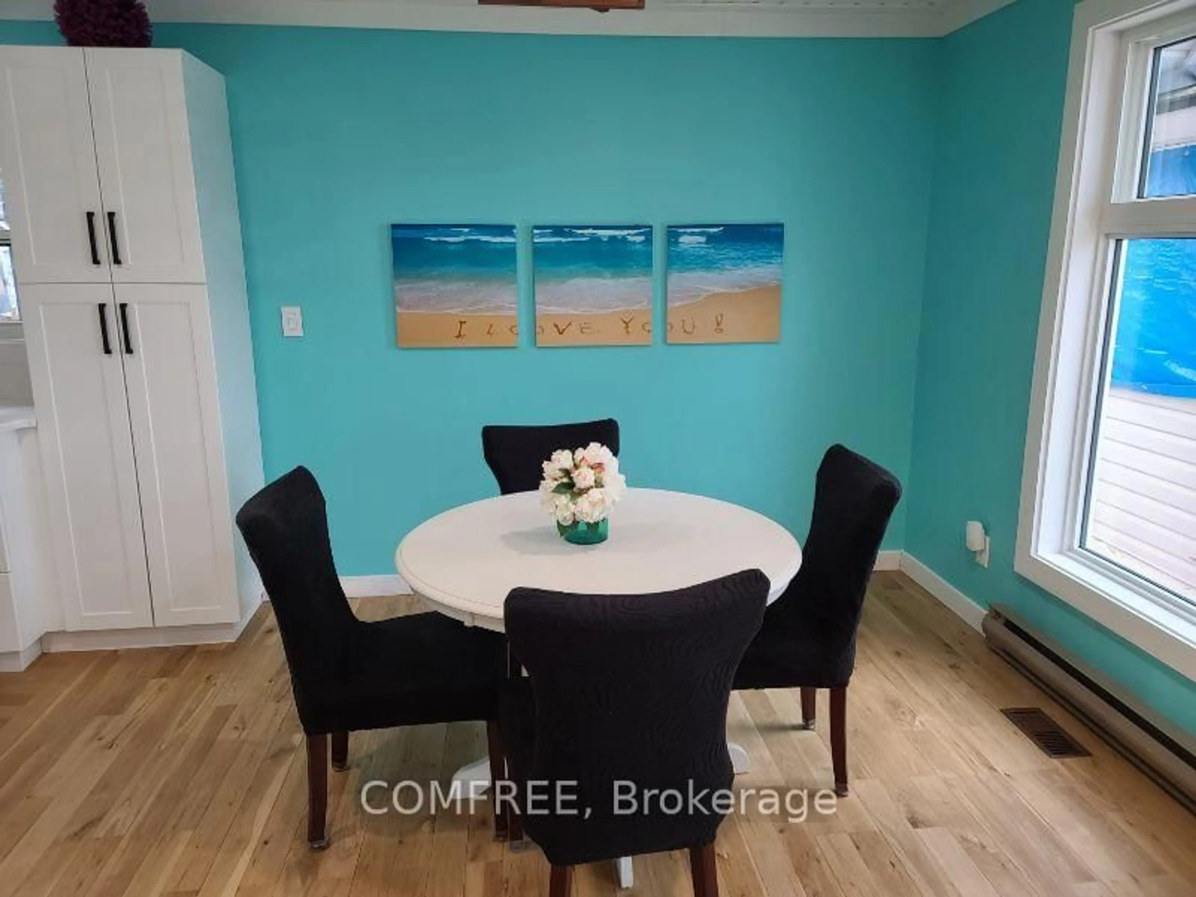 Dining room, wood/laminate floor for 38 Turgeon Lane, East Ferris Ontario P0H 1B0