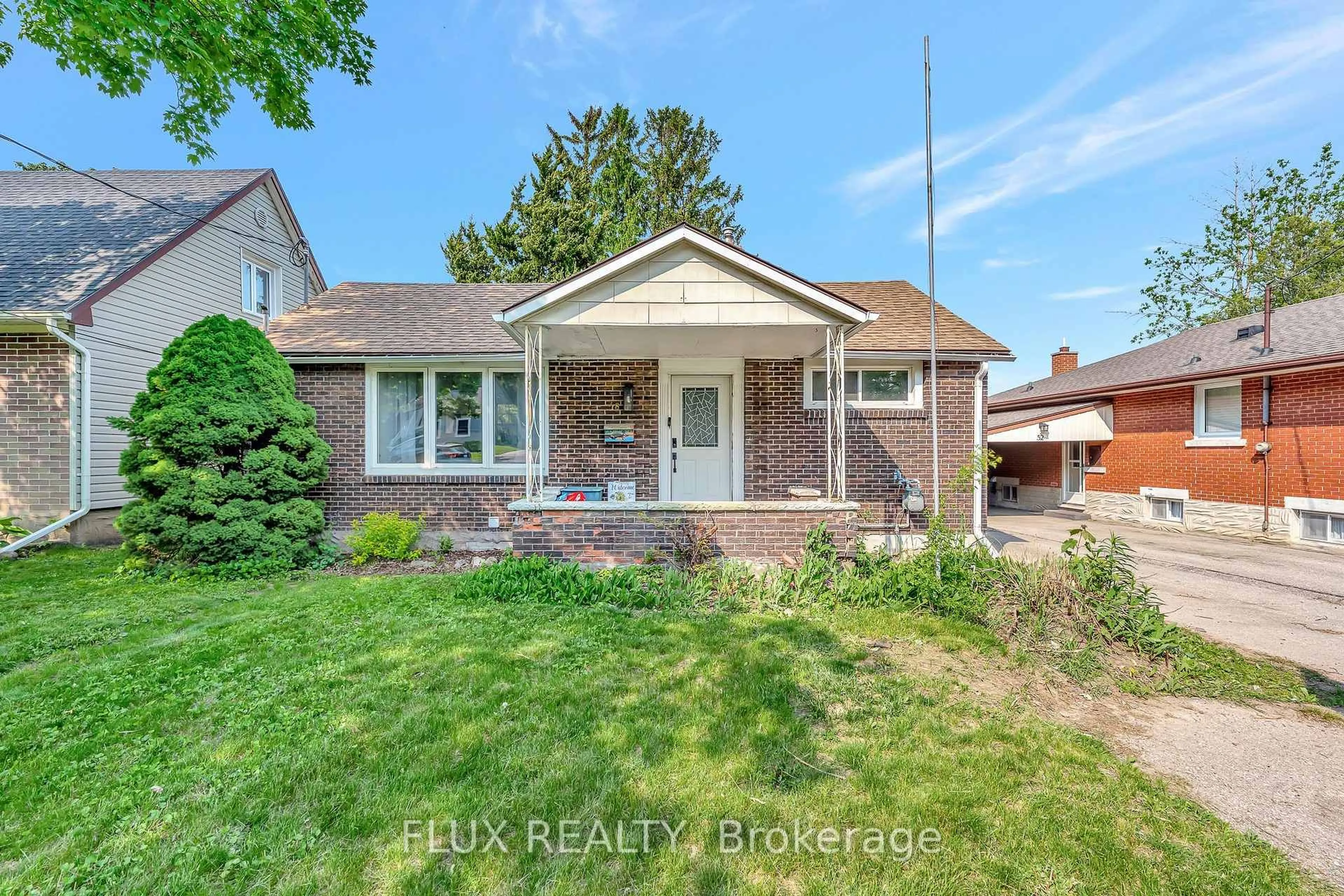 Home with brick exterior material, street for 48 Belmont Ave, Kitchener Ontario N2M 4B9