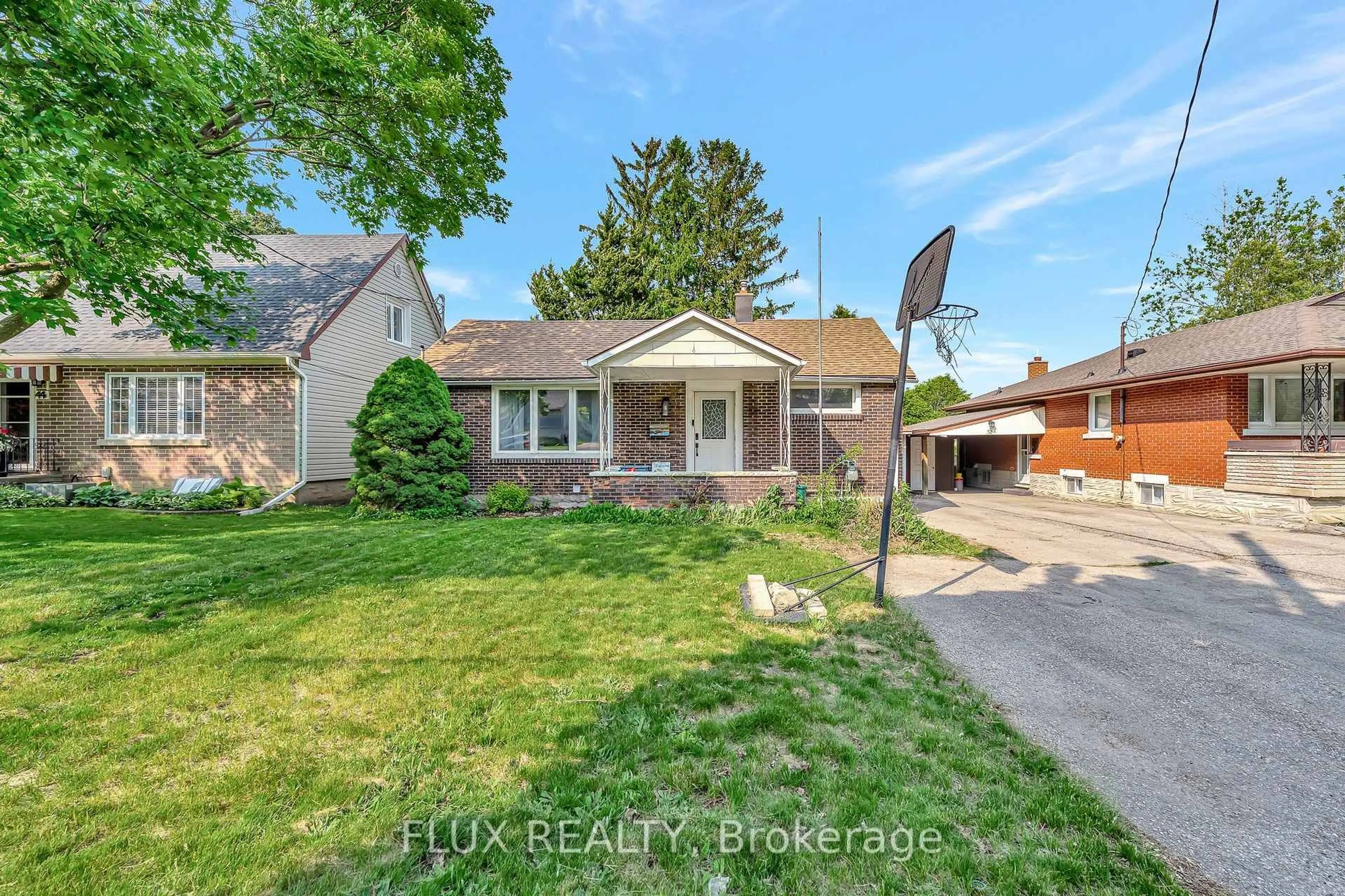 Home with brick exterior material, street for 48 Belmont Ave, Kitchener Ontario N2M 4B9