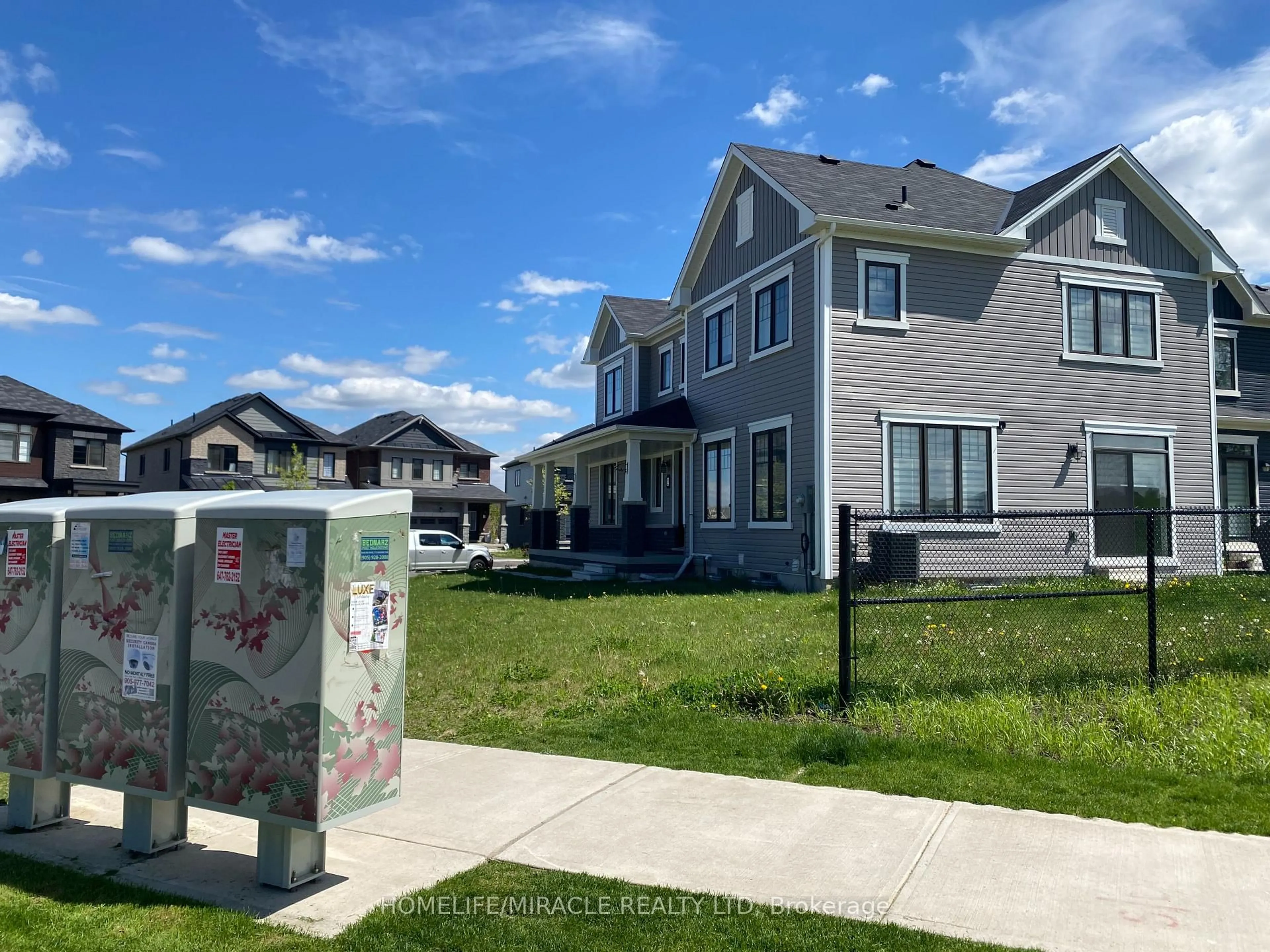 Home with vinyl exterior material, street for 2 Cahill Dr, Brantford Ontario N3T 0V5
