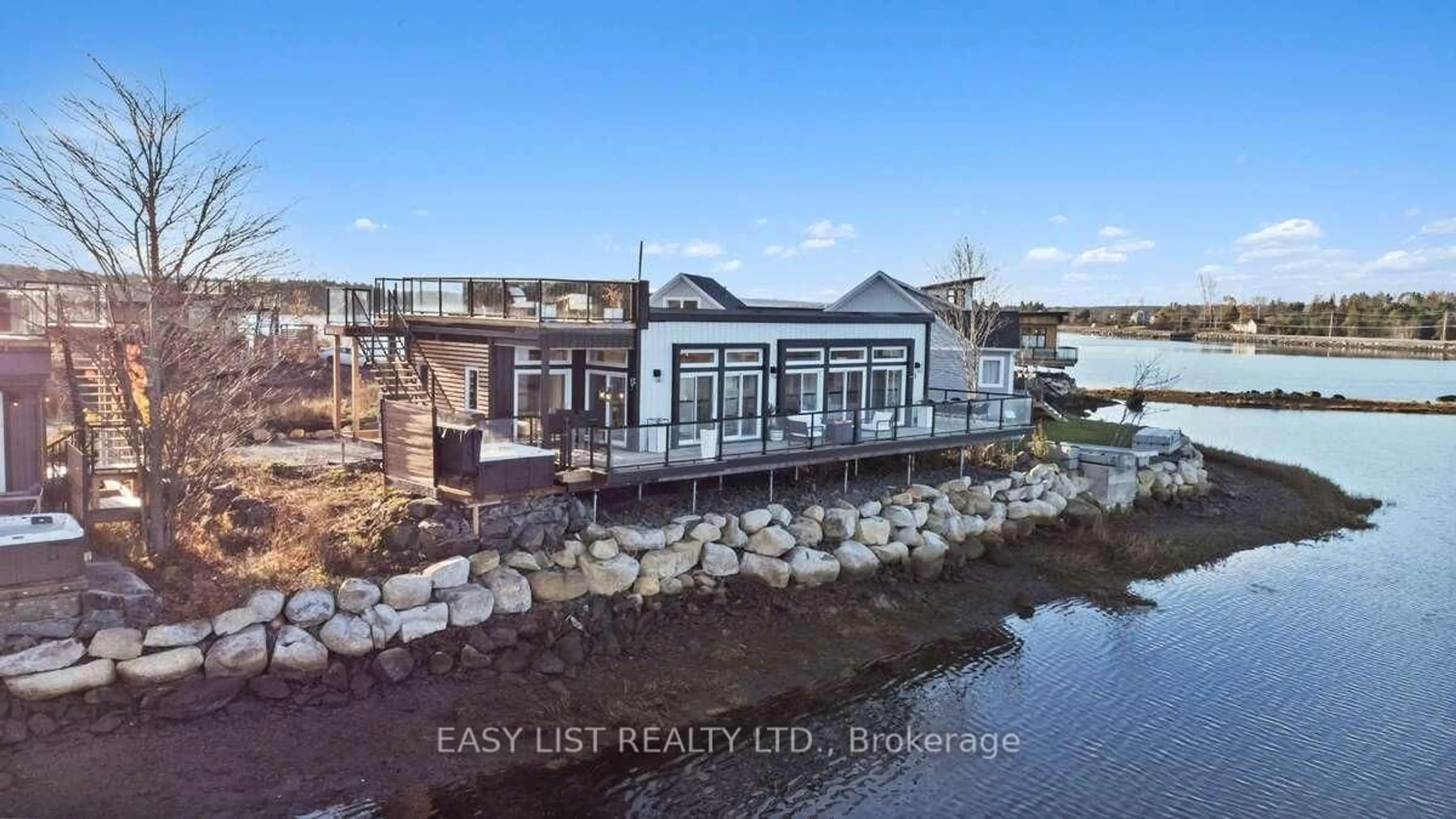 A pic from outside/outdoor area/front of a property/back of a property/a pic from drone, water/lake/river/ocean view for 693 Mason Beach Rd #2, Out of Area NS B0J 2C0