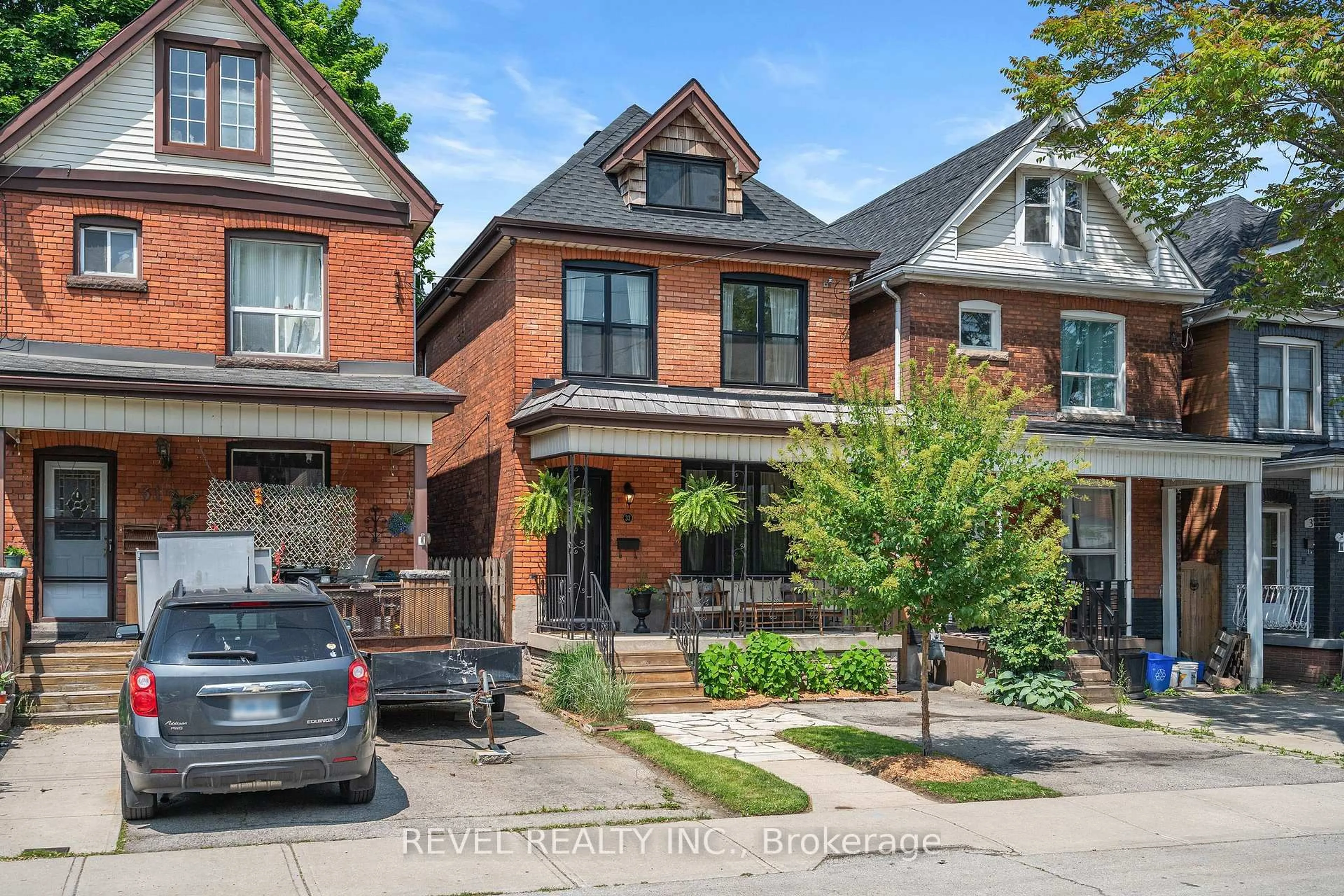 Home with brick exterior material, street for 33 Holton Ave, Hamilton Ontario L8L 6H3