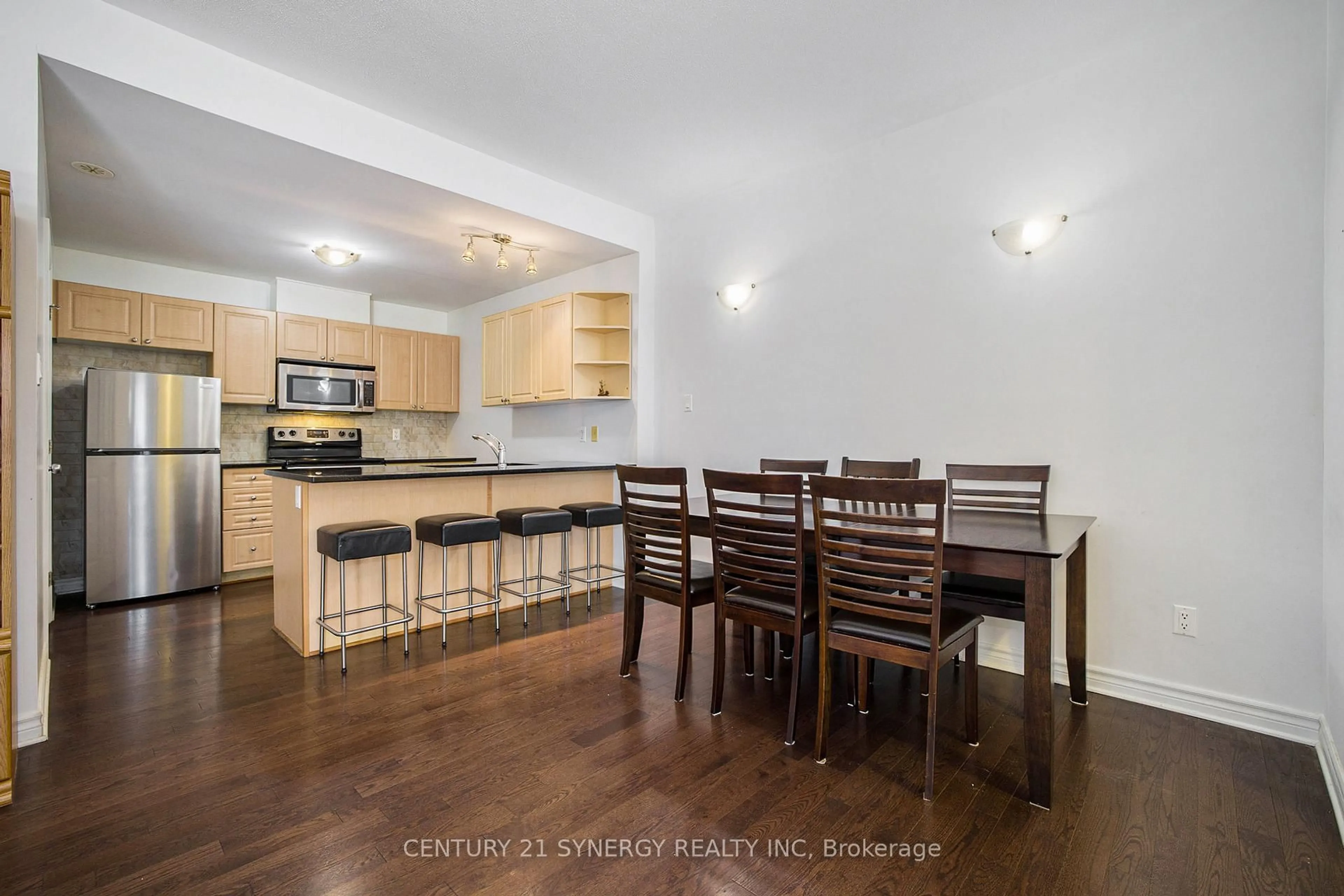 Open concept kitchen, wood/laminate floor for 201 Espresso Private #A, Ottawa Ontario K1T 0K5