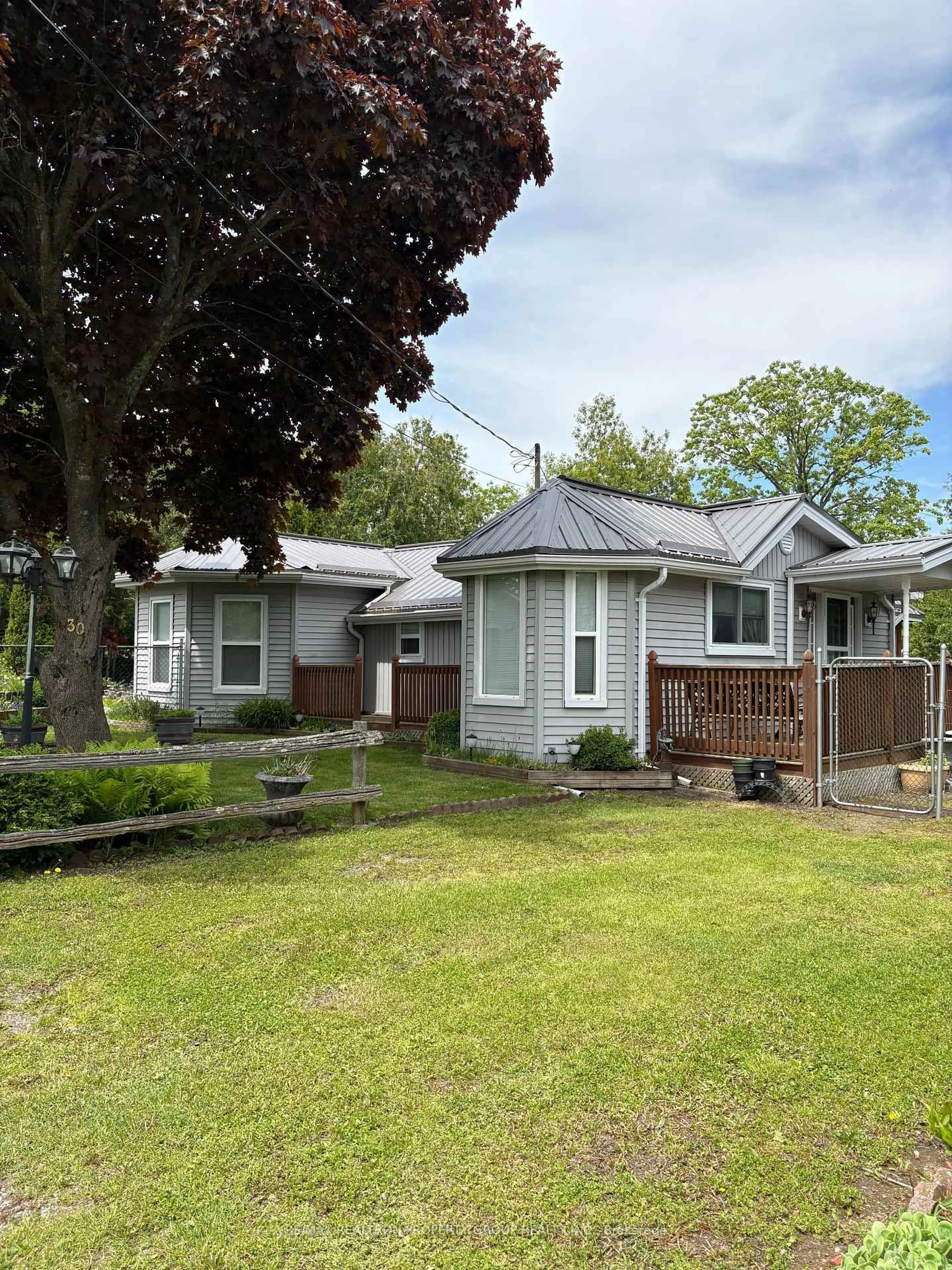 A pic from outside/outdoor area/front of a property/back of a property/a pic from drone, street for 30E Bass Lane, Trent Hills Ontario K0L 1L0