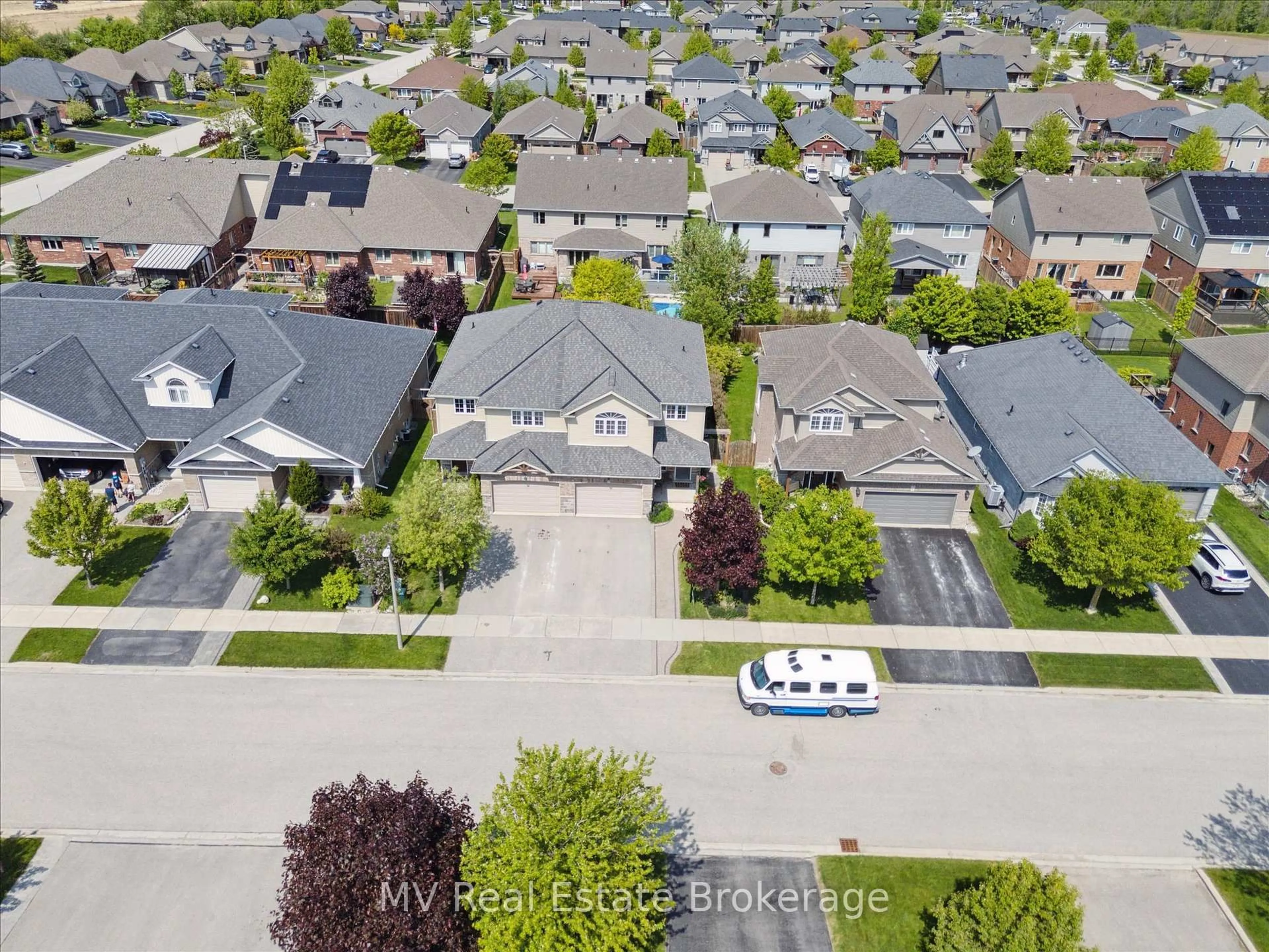 A pic from outside/outdoor area/front of a property/back of a property/a pic from drone, street for 71 Healey St, Centre Wellington Ontario N0B 1S0