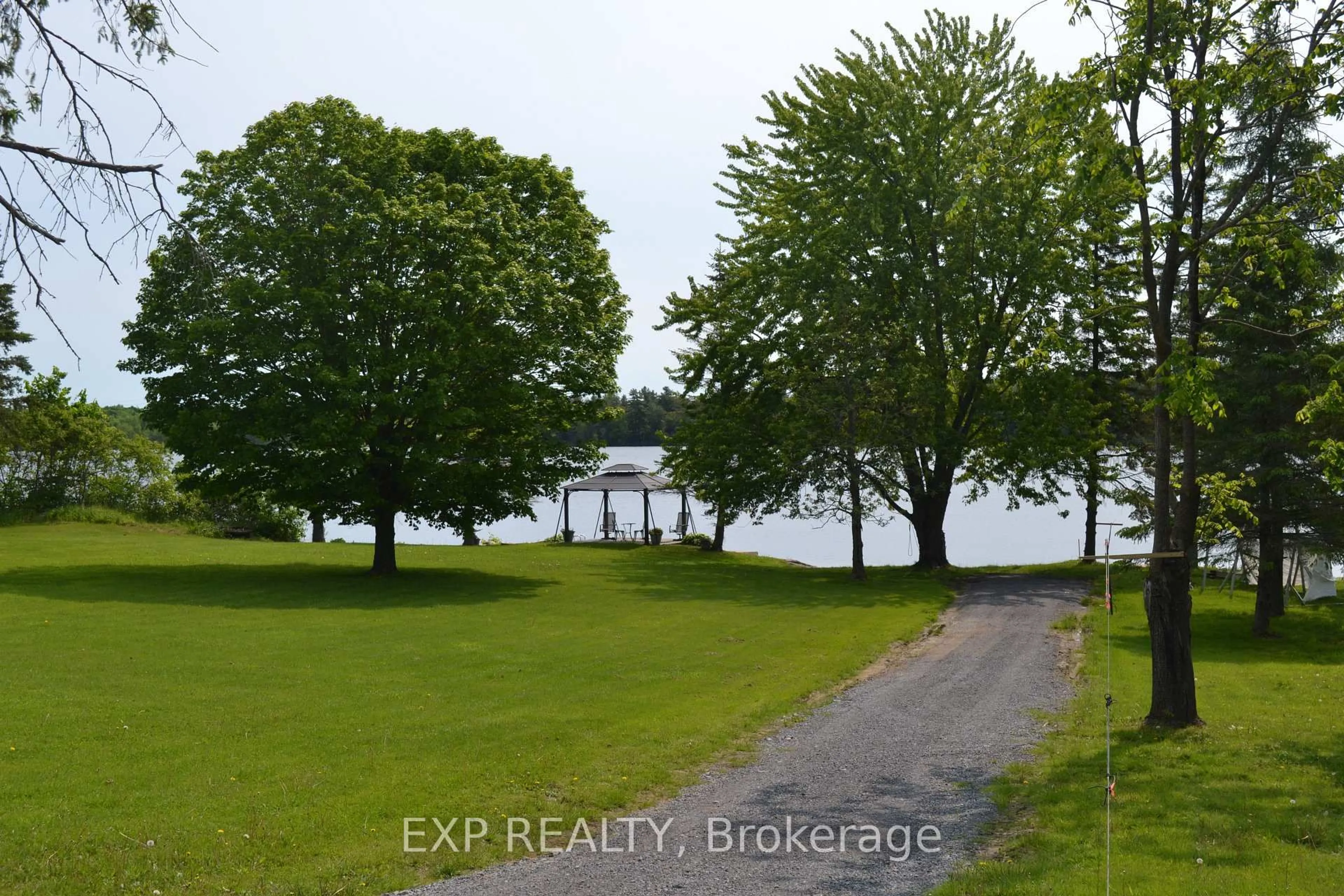 A pic from outside/outdoor area/front of a property/back of a property/a pic from drone, water/lake/river/ocean view for 1125 Dalton Lane, Godfrey Ontario K0H 1T0