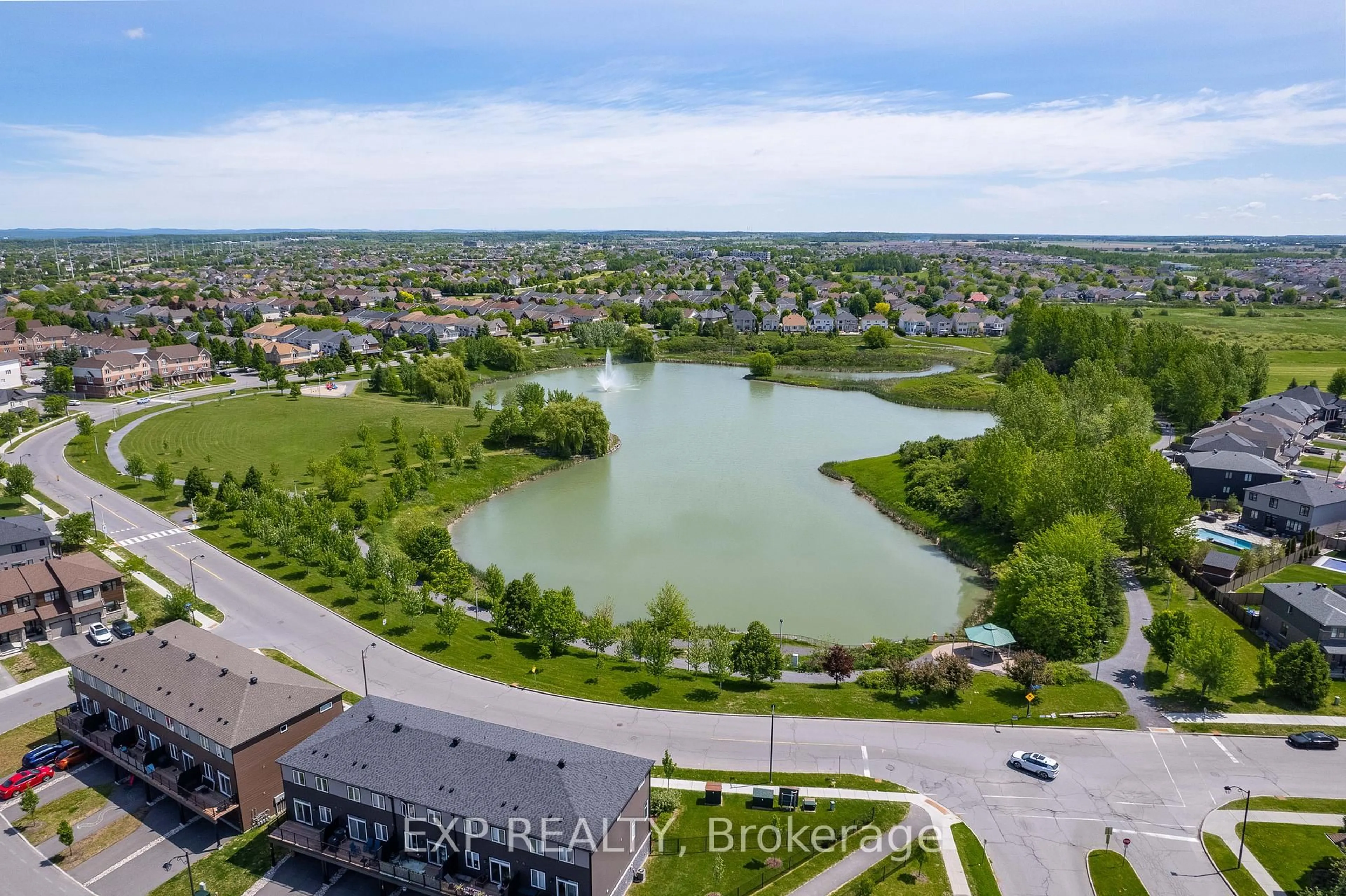 A pic from outside/outdoor area/front of a property/back of a property/a pic from drone, water/lake/river/ocean view for 142 Bluestone Private #142, Ottawa Ontario K4A 0X7