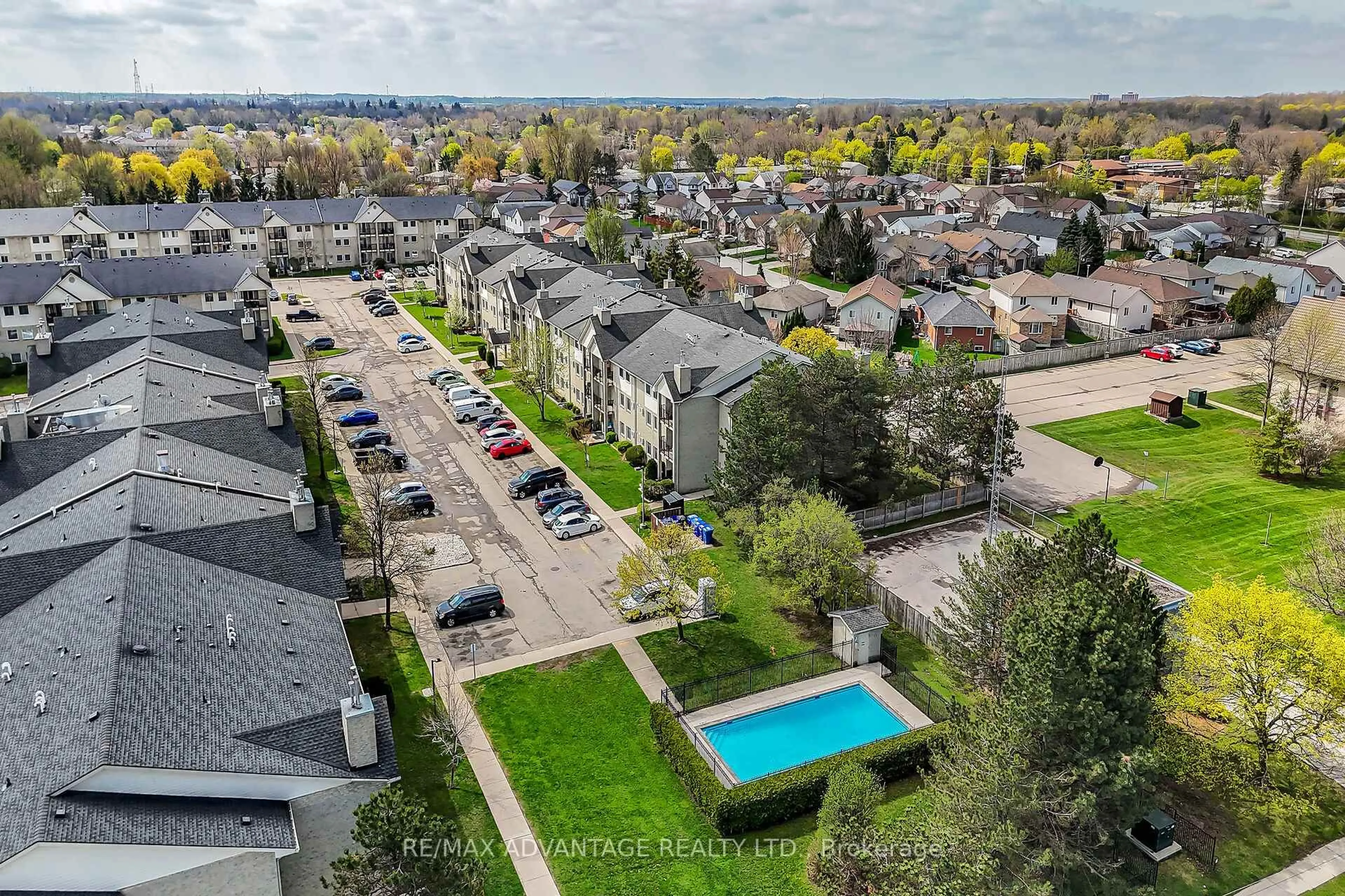 A pic from outside/outdoor area/front of a property/back of a property/a pic from drone, city buildings view from balcony for 725 Deveron Cres #215, London South Ontario N5Z 4X3