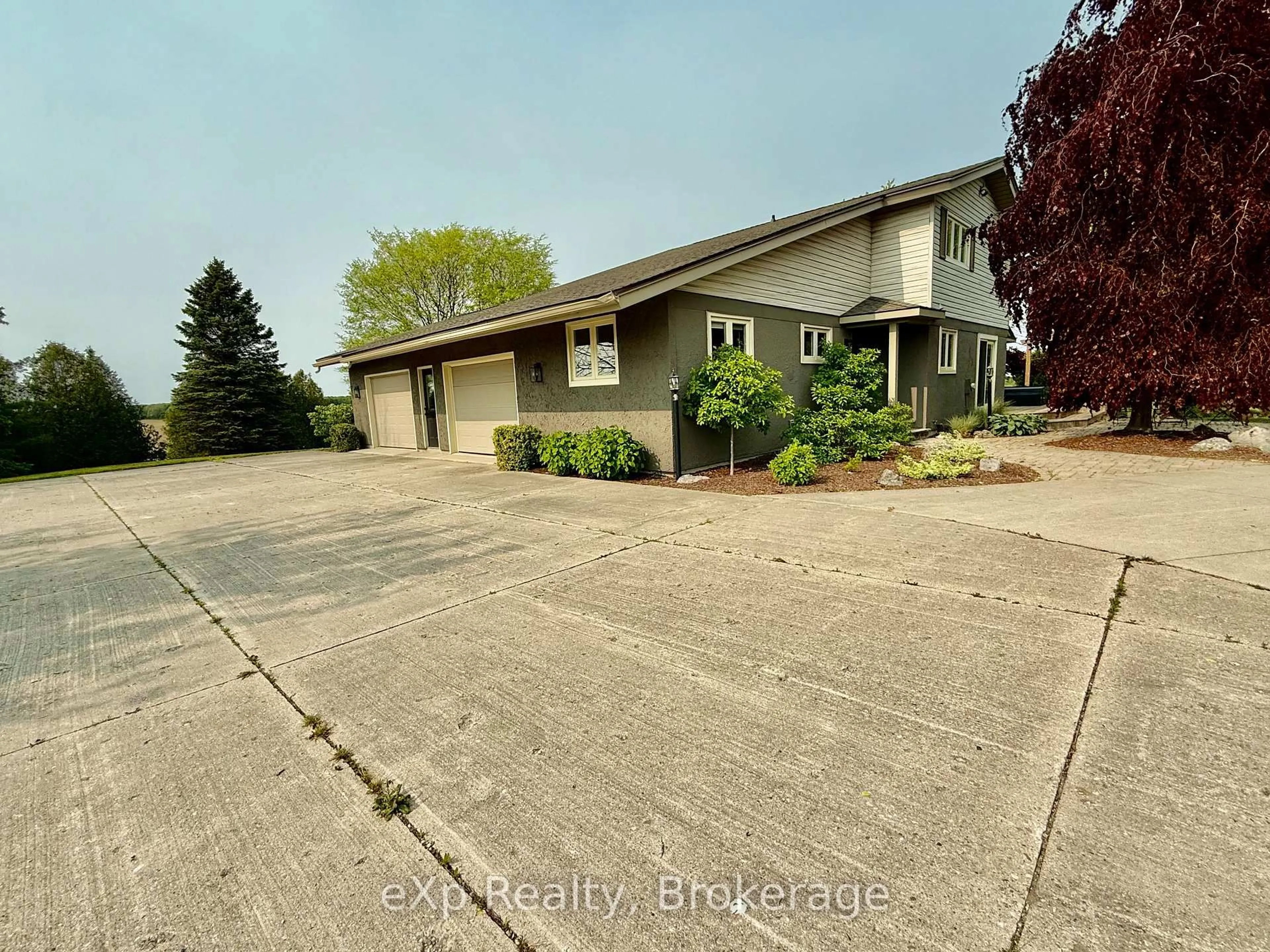 A pic from outside/outdoor area/front of a property/back of a property/a pic from drone, street for 93 Sideroad 40, South Bruce Ontario N0G 2J0