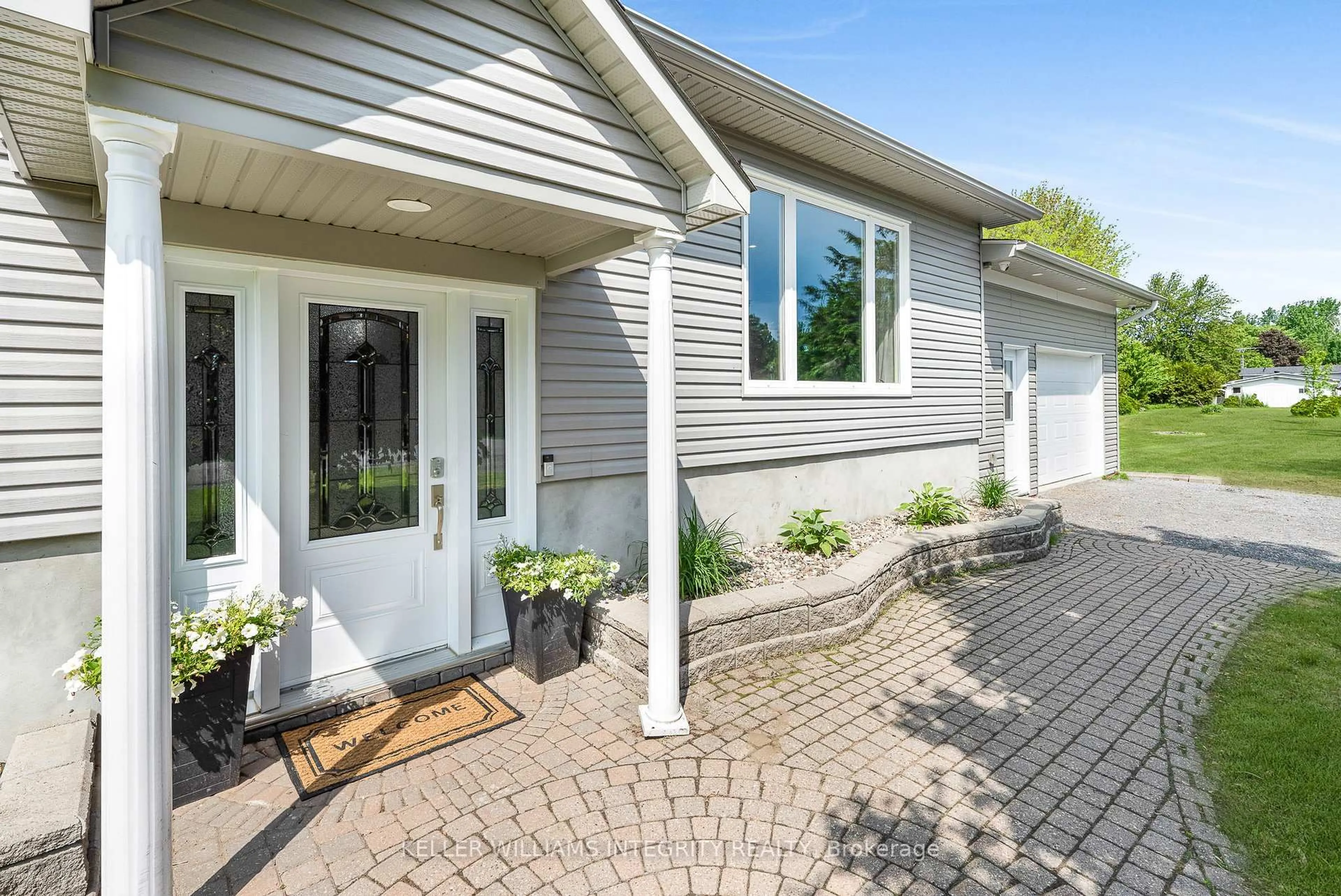 Home with vinyl exterior material, street for 64 Beaver Lane, The Nation Ontario K0A 2M0