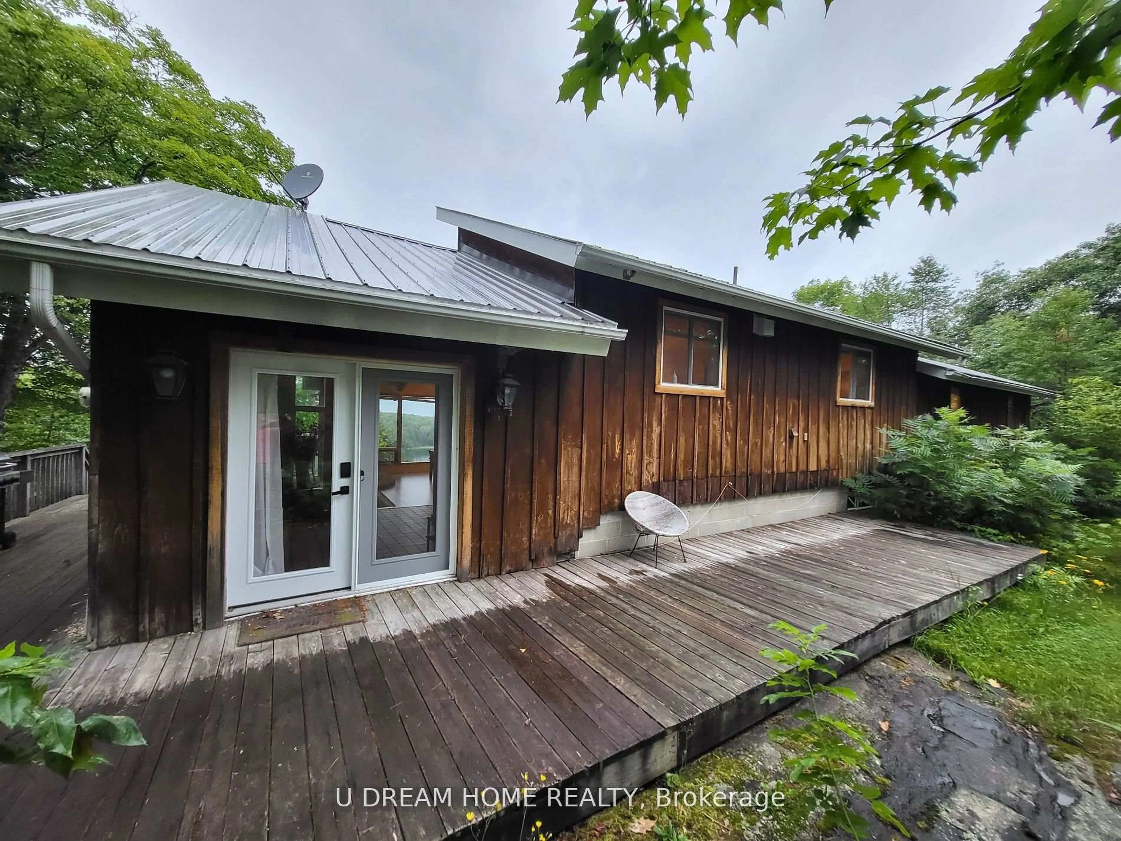 A pic from outside/outdoor area/front of a property/back of a property/a pic from drone, water/lake/river/ocean view for 454 Silver Lake Rd, Magnetawan Ontario P0A 1P0