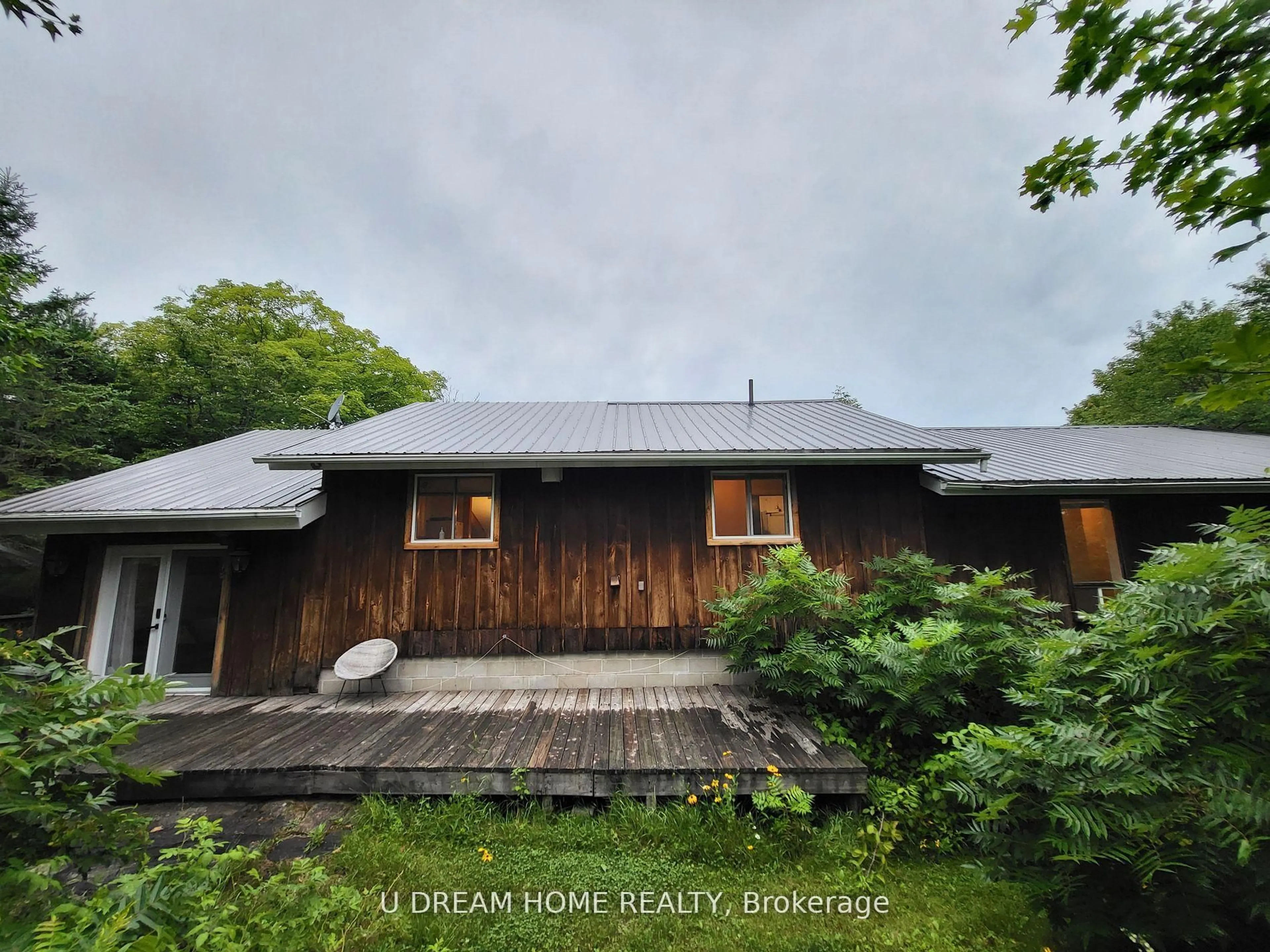 A pic from outside/outdoor area/front of a property/back of a property/a pic from drone, unknown for 454 Silver Lake Rd, Magnetawan Ontario P0A 1P0