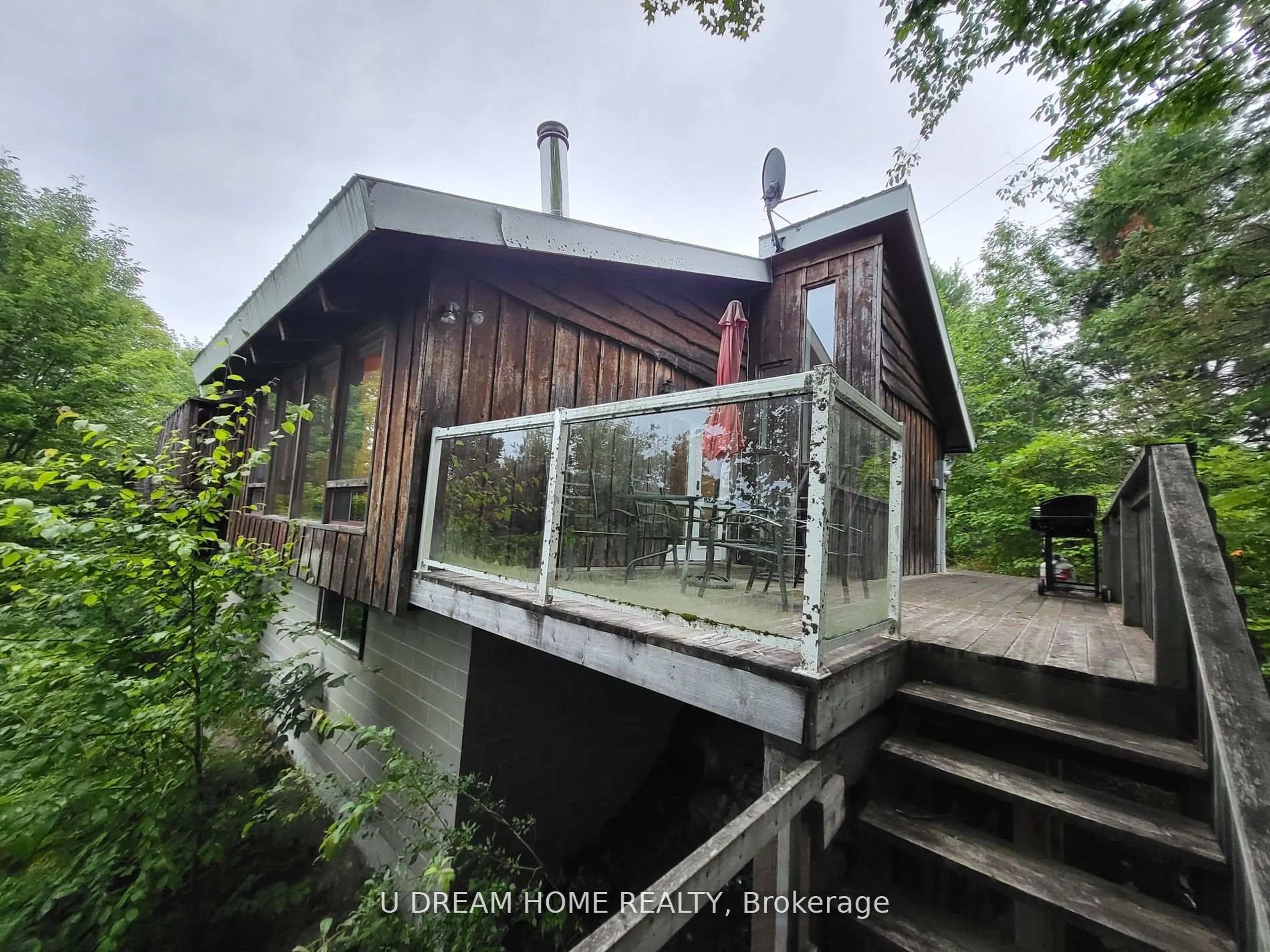 A pic from outside/outdoor area/front of a property/back of a property/a pic from drone, water/lake/river/ocean view for 454 Silver Lake Rd, Magnetawan Ontario P0A 1P0