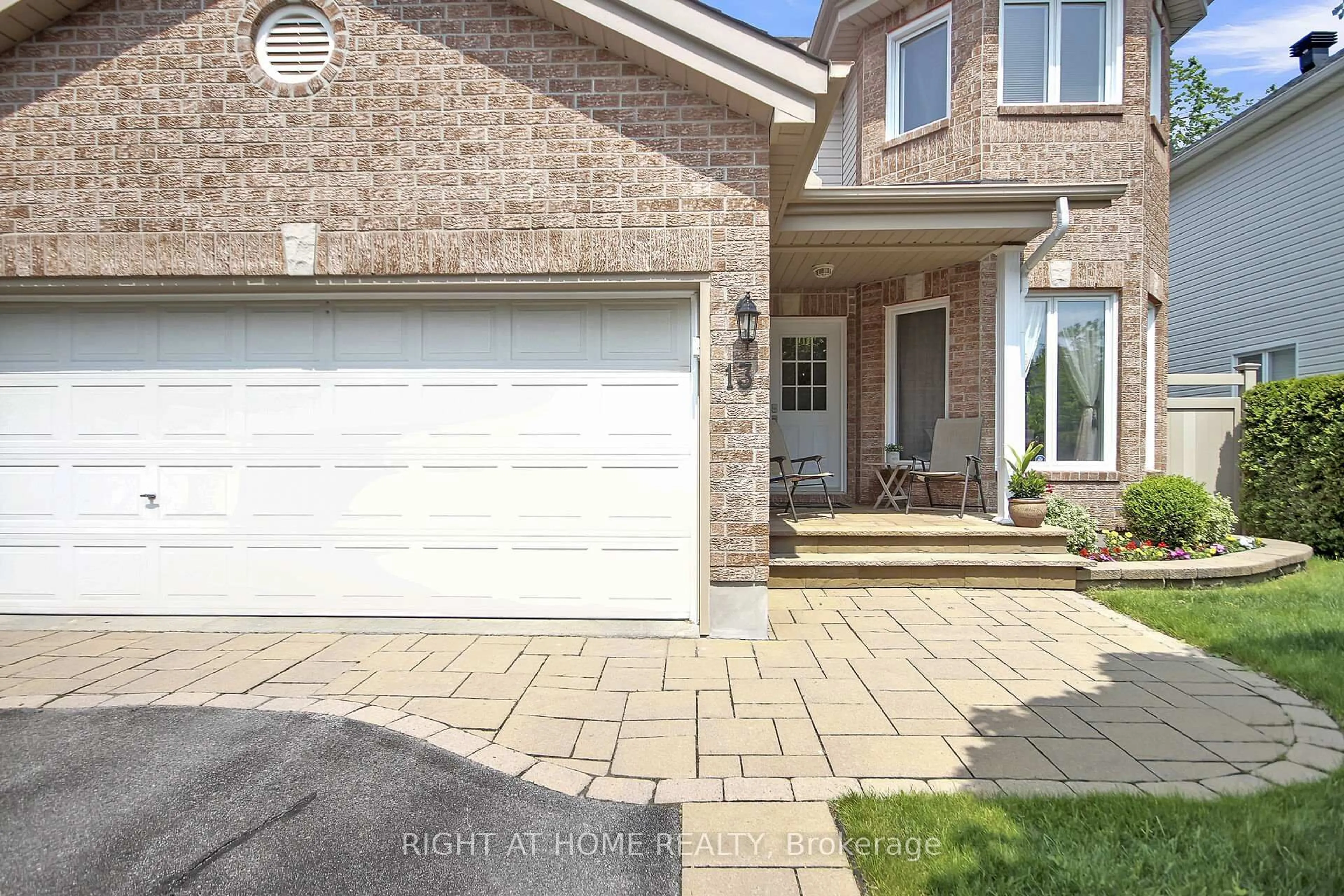 Home with brick exterior material, street for 13 Sirocco Cres, Stittsville Ontario K2S 1Z7