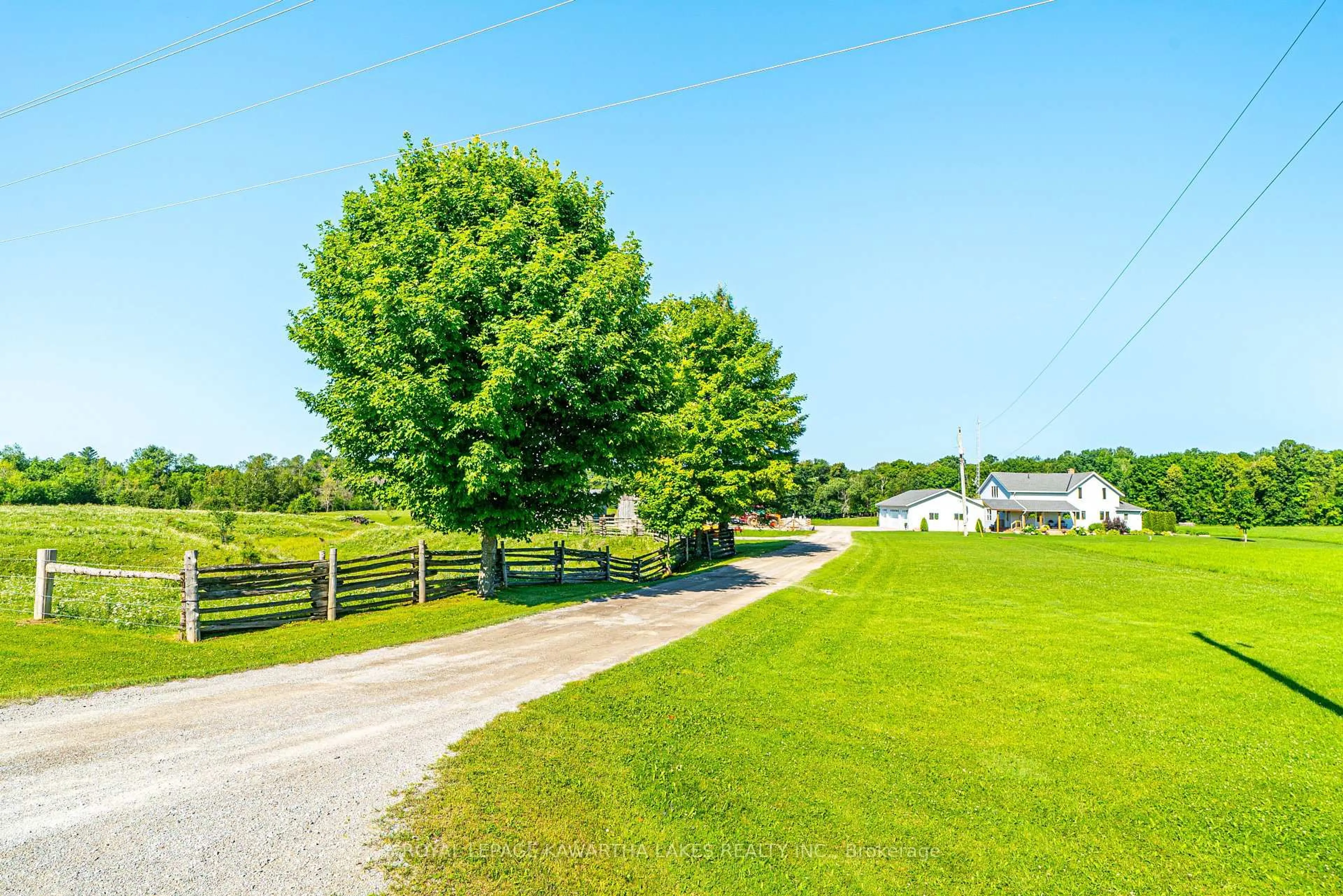 A pic from outside/outdoor area/front of a property/back of a property/a pic from drone, unknown for 2433 County Road 121 Rd, Kawartha Lakes Ontario K0M 1C0