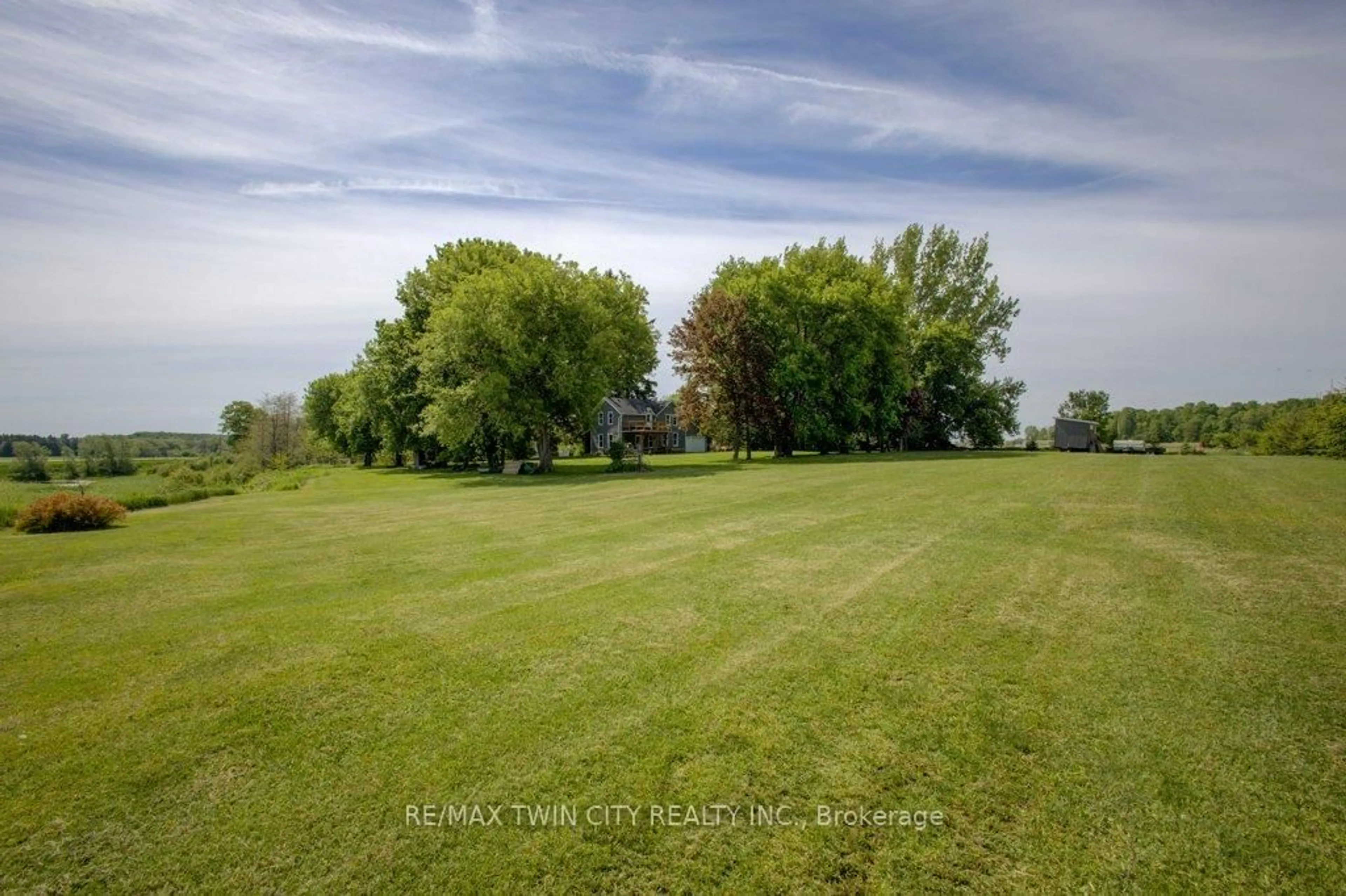 A pic from outside/outdoor area/front of a property/back of a property/a pic from drone, forest/trees view for 86561 London Rd, North Huron Ontario N0G 2W0