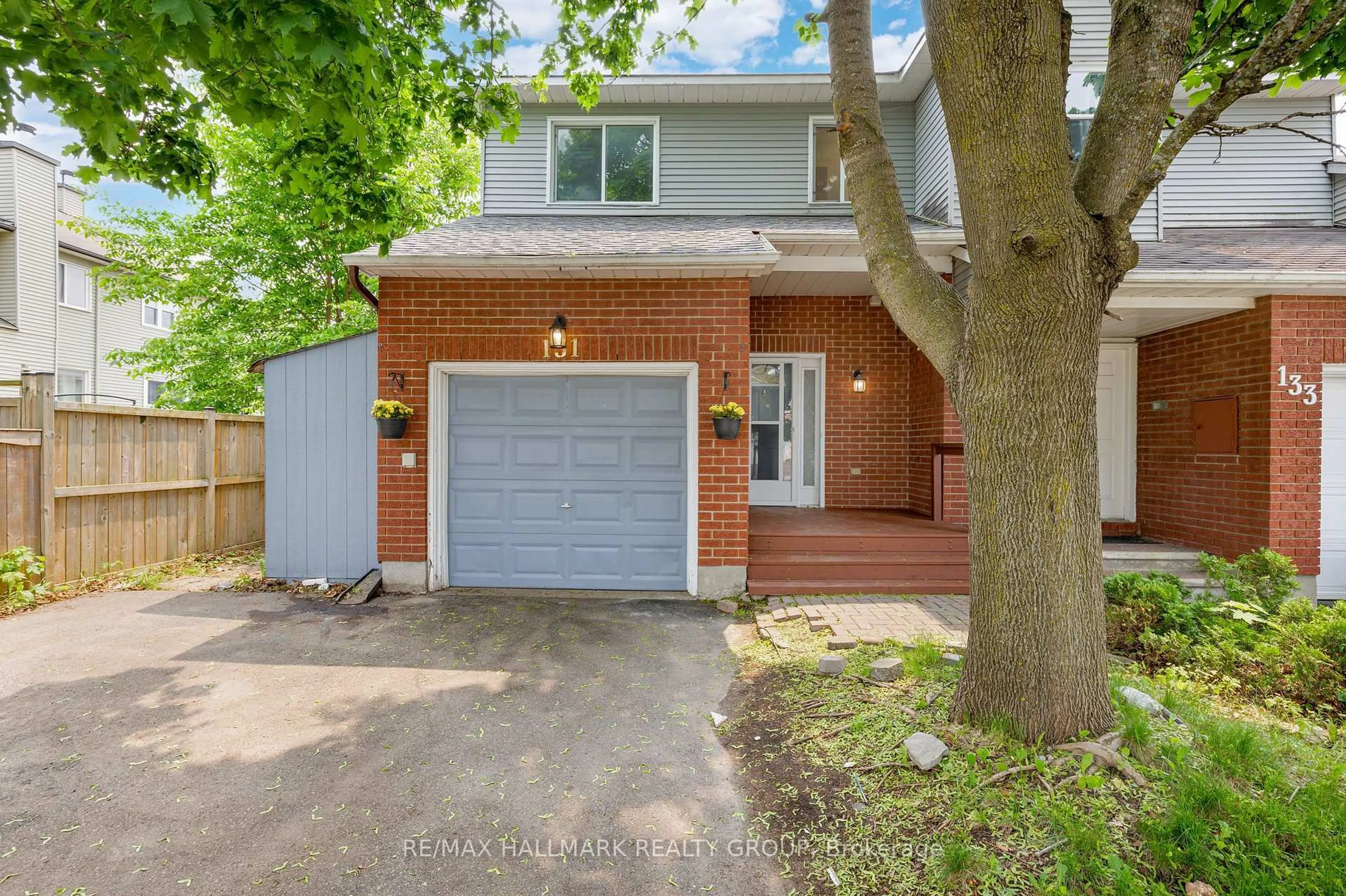 Home with brick exterior material, street for 131 Tartan Dr, Ottawa Ontario K2J 3S6