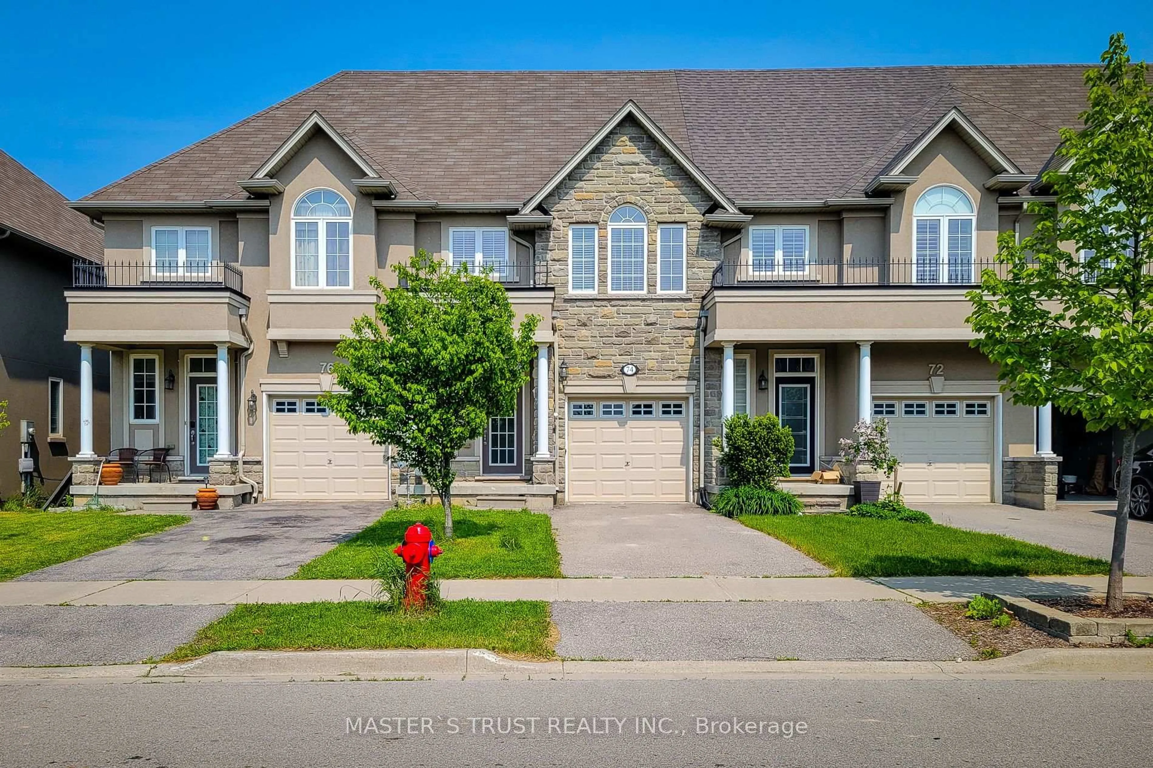 Home with brick exterior material, street for 74 Vinton Rd, Hamilton Ontario L9K 0G6