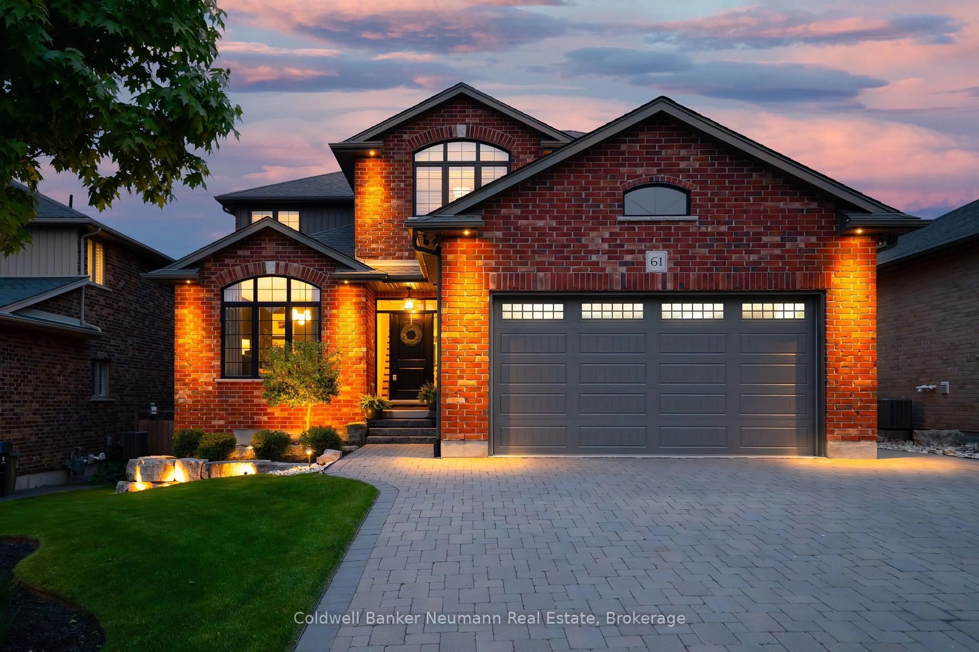 Home with brick exterior material, street for 61 Law Dr, Guelph Ontario N1E 7J6