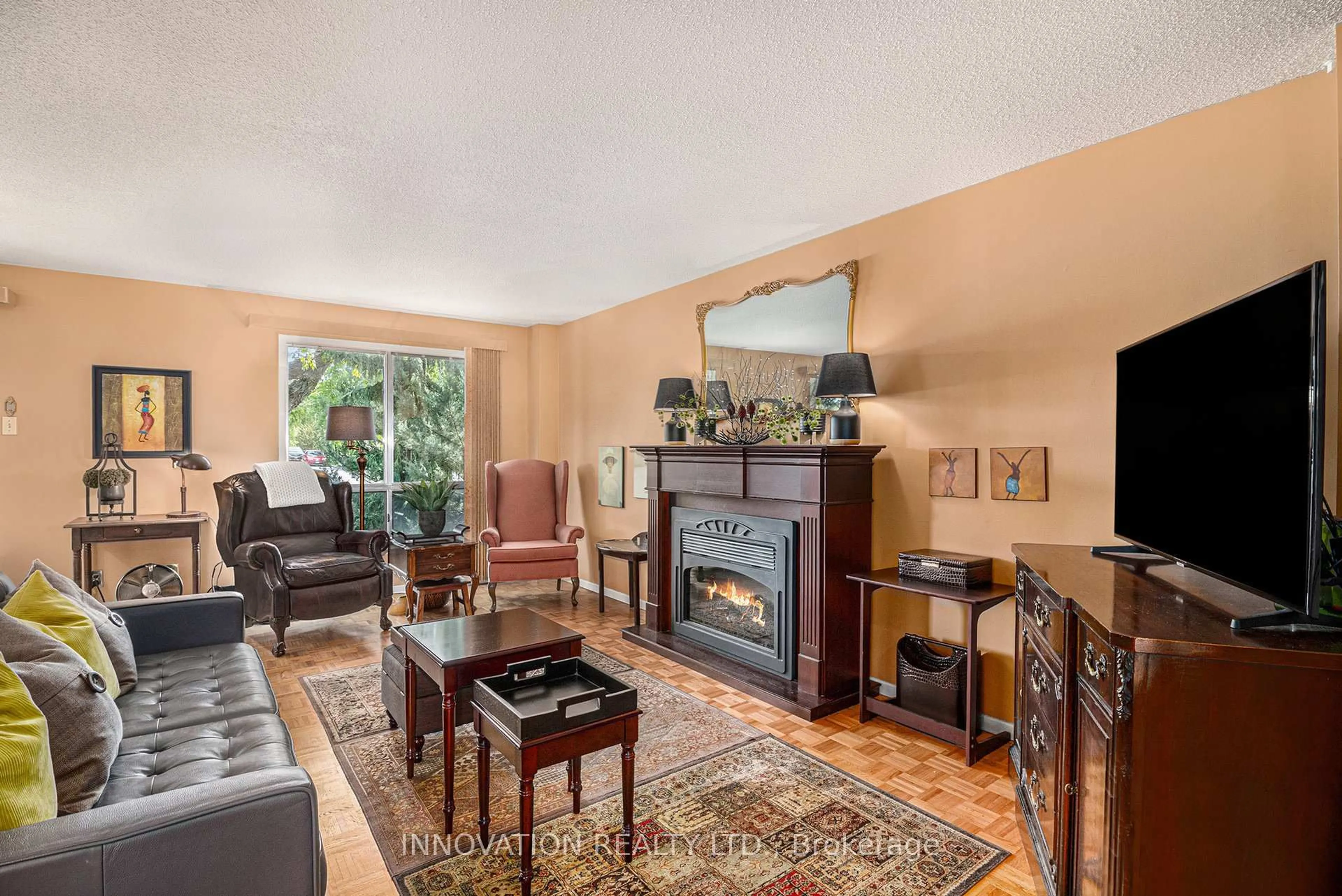 Living room with furniture, unknown for 45 River Garden Private #75, Ottawa Ontario K1V 1M8
