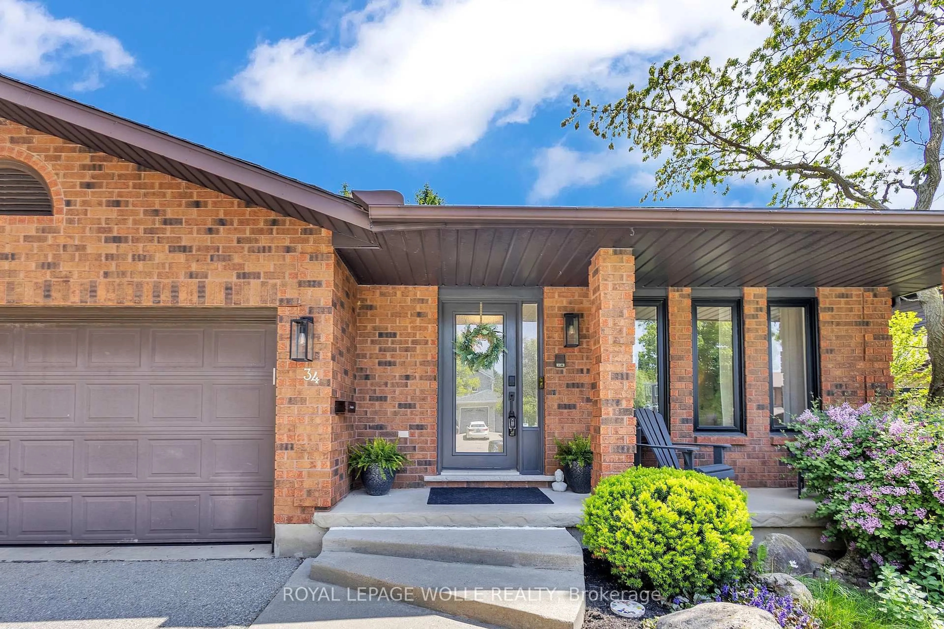 Home with brick exterior material, street for 34 Daimler Dr, Kitchener Ontario N2A 3W2