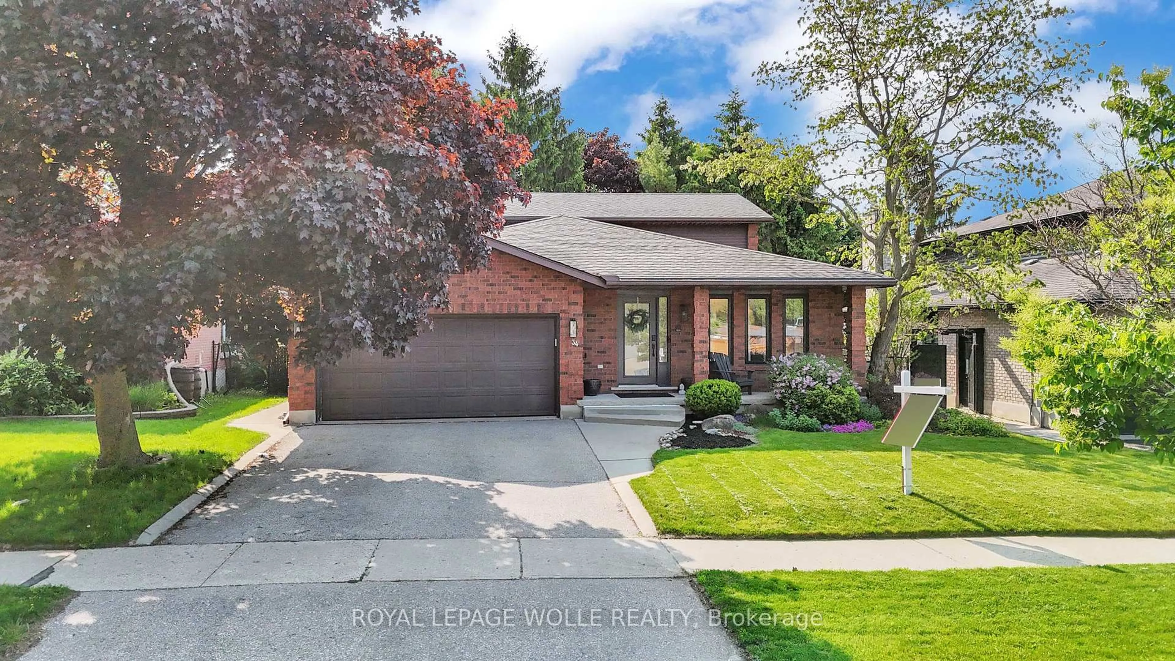 Home with brick exterior material, street for 34 Daimler Dr, Kitchener Ontario N2A 3W2