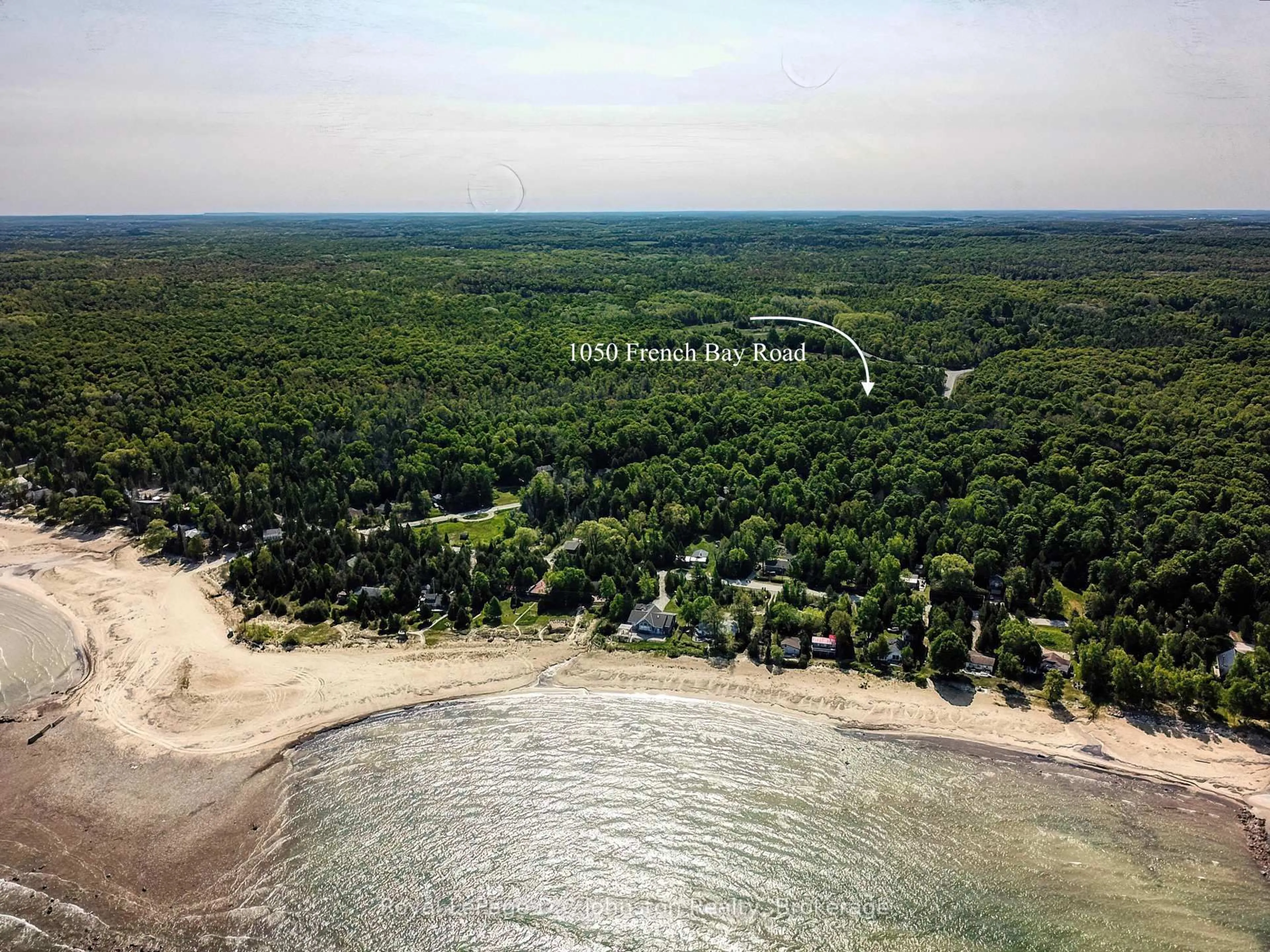 A pic from outside/outdoor area/front of a property/back of a property/a pic from drone, water/lake/river/ocean view for 1050 French Bay Rd, Native Leased Lands Ontario N0H 2L0