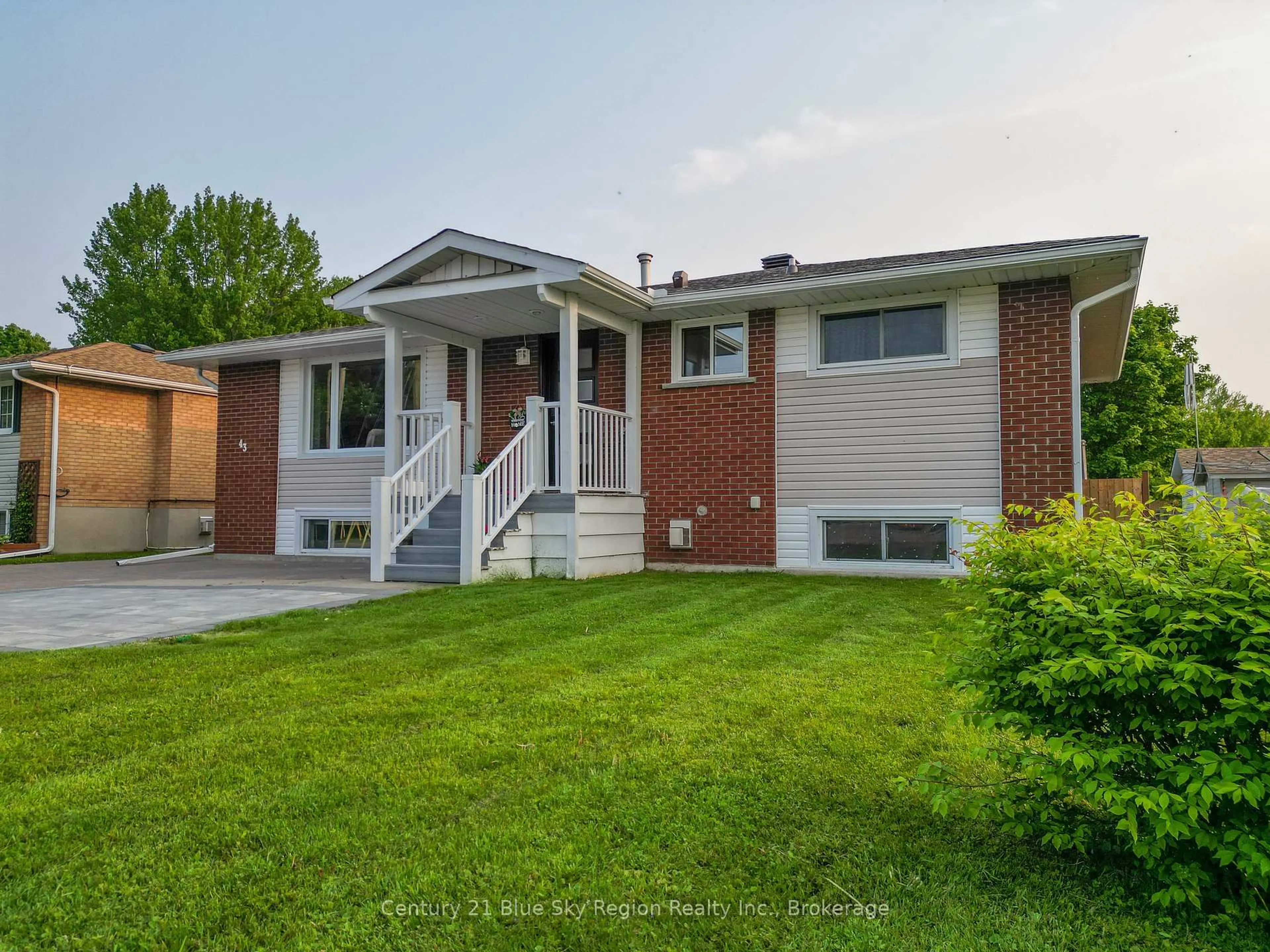 Home with brick exterior material, street for 43 Marshall Park Dr, North Bay Ontario P1A 2P1