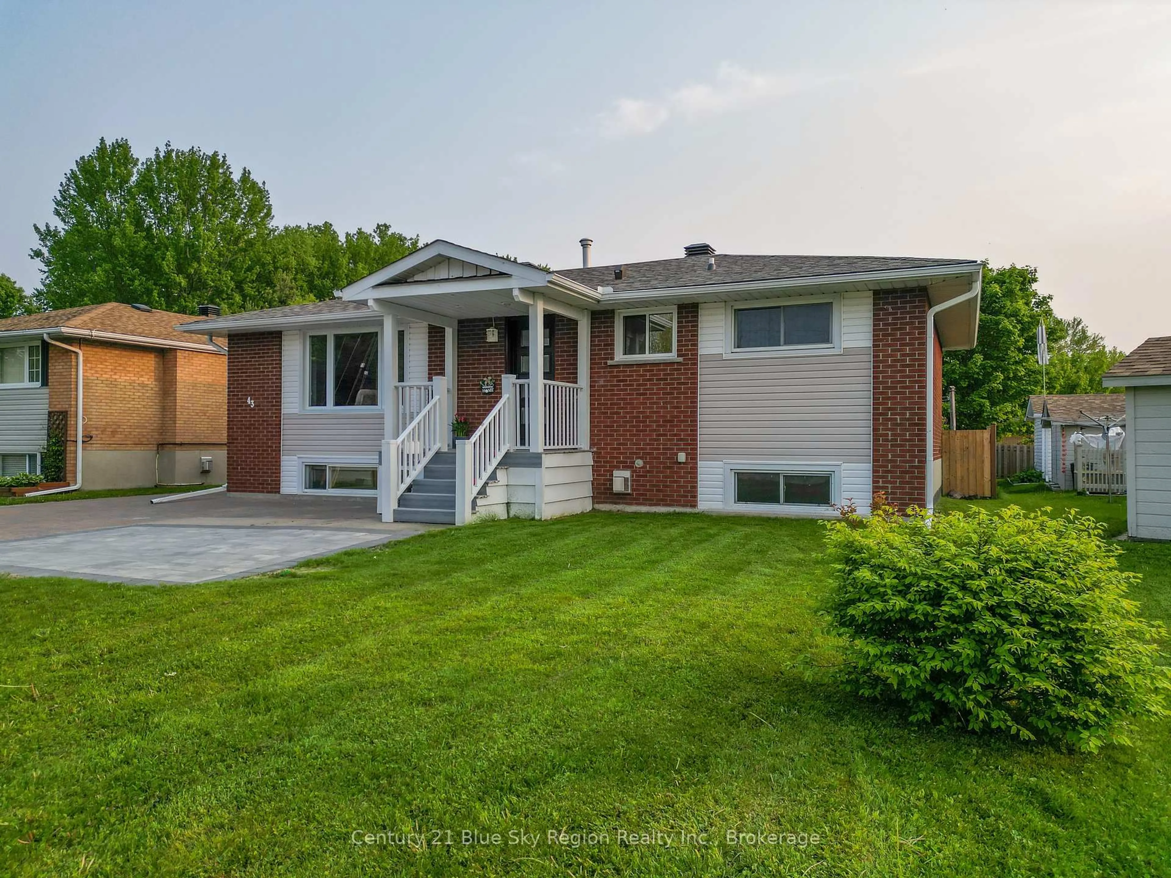 Home with brick exterior material, street for 43 Marshall Park Dr, North Bay Ontario P1A 2P1