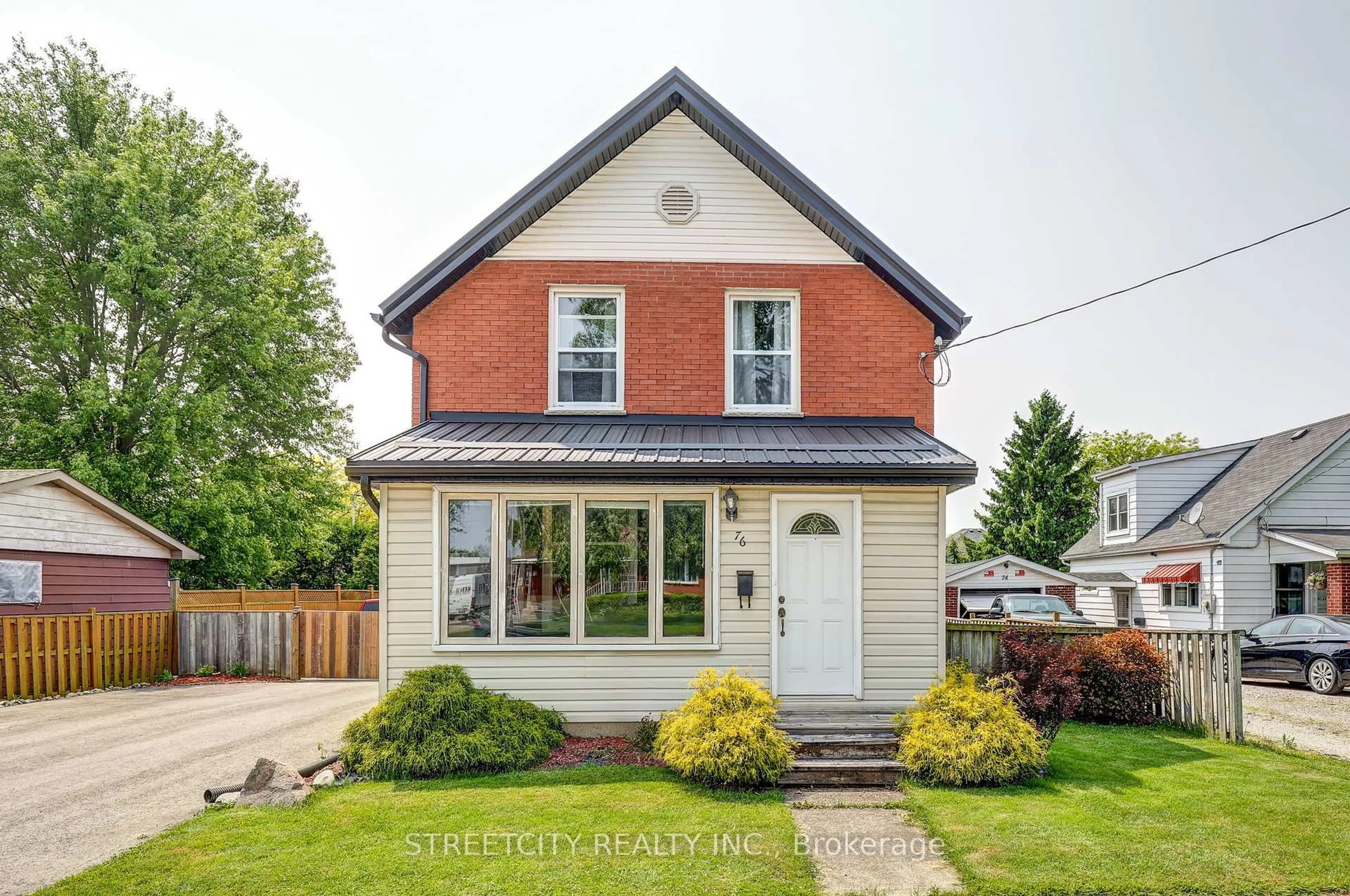 Home with brick exterior material, street for 76 Fairview Ave, St. Thomas Ontario N5R 4X6