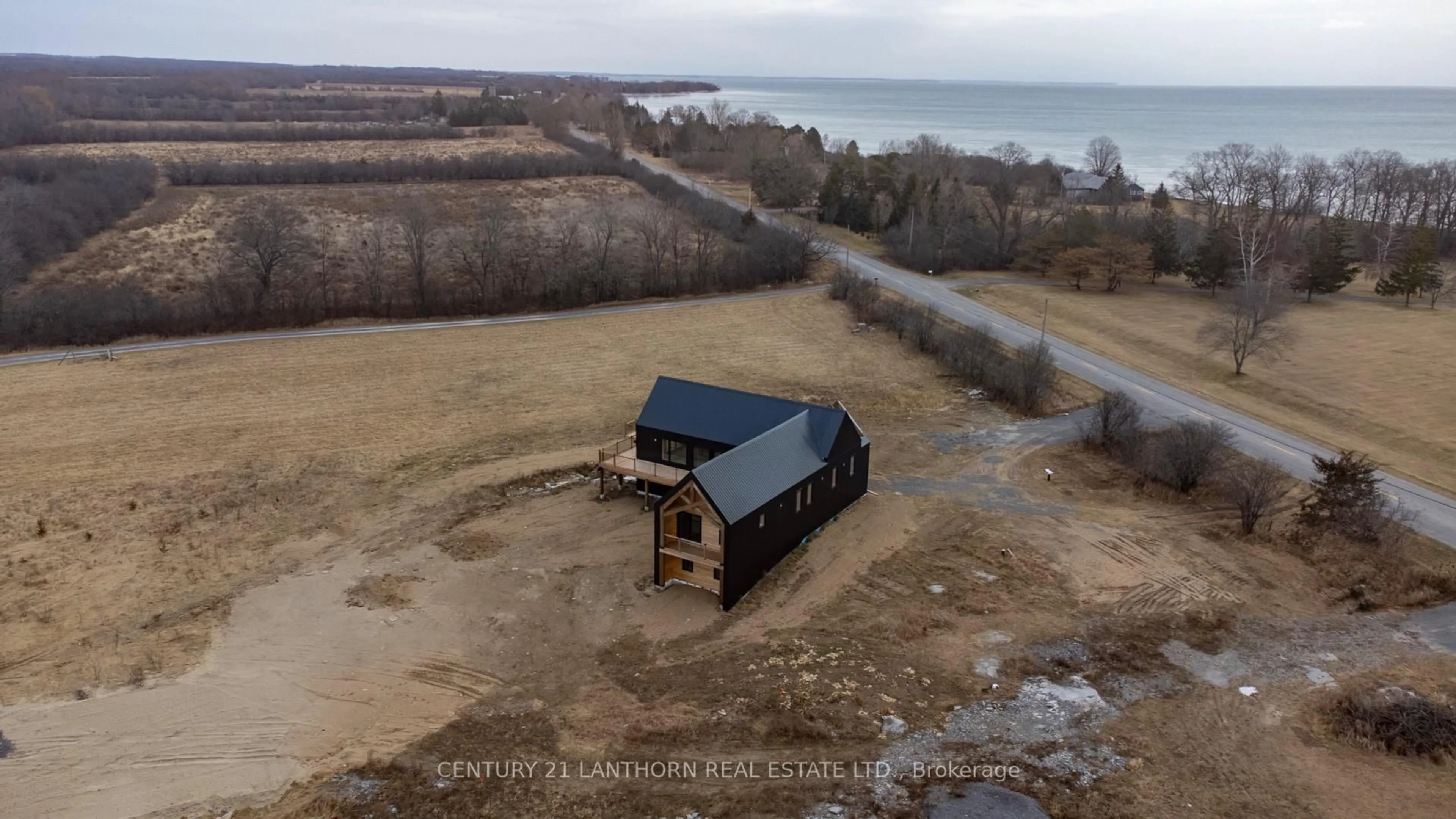 A pic from outside/outdoor area/front of a property/back of a property/a pic from drone, water/lake/river/ocean view for 1150 County Road 20 Rd, Prince Edward County Ontario K0K 2L0