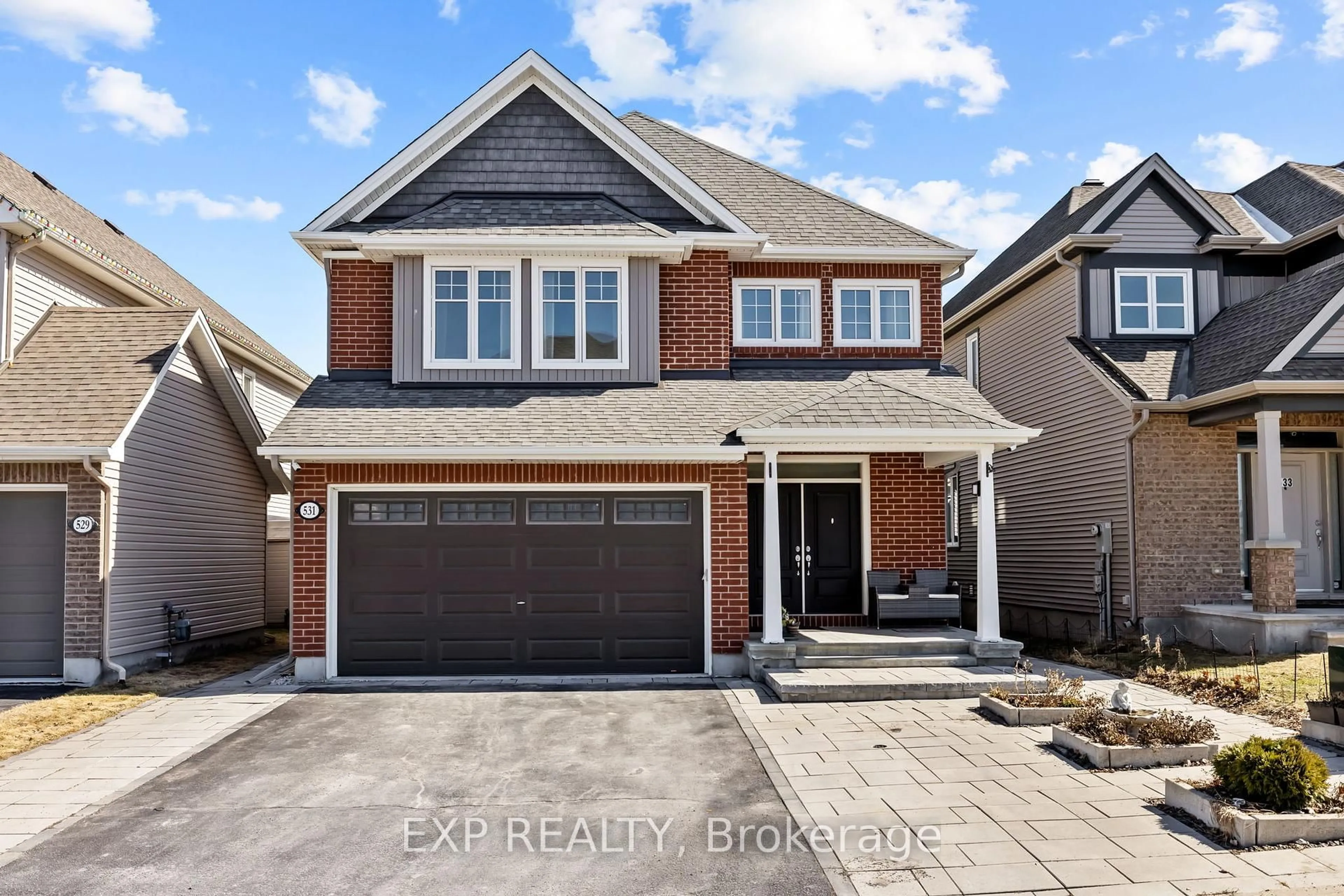Home with brick exterior material, street for 531 Vivera Pl, Stittsville Ontario K2S 0W2