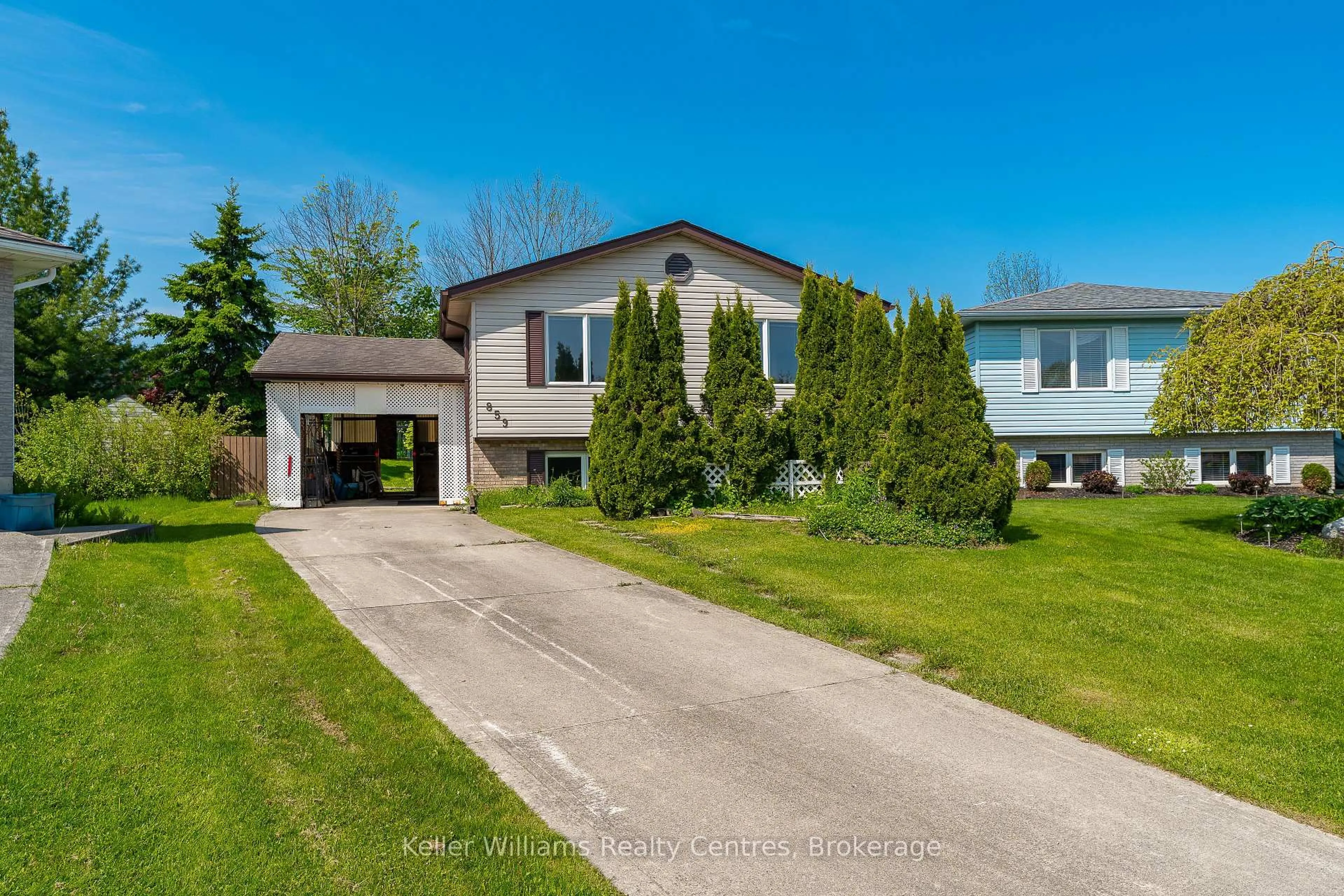 A pic from outside/outdoor area/front of a property/back of a property/a pic from drone, street for 859 26th St, Owen Sound Ontario N4K 6T4
