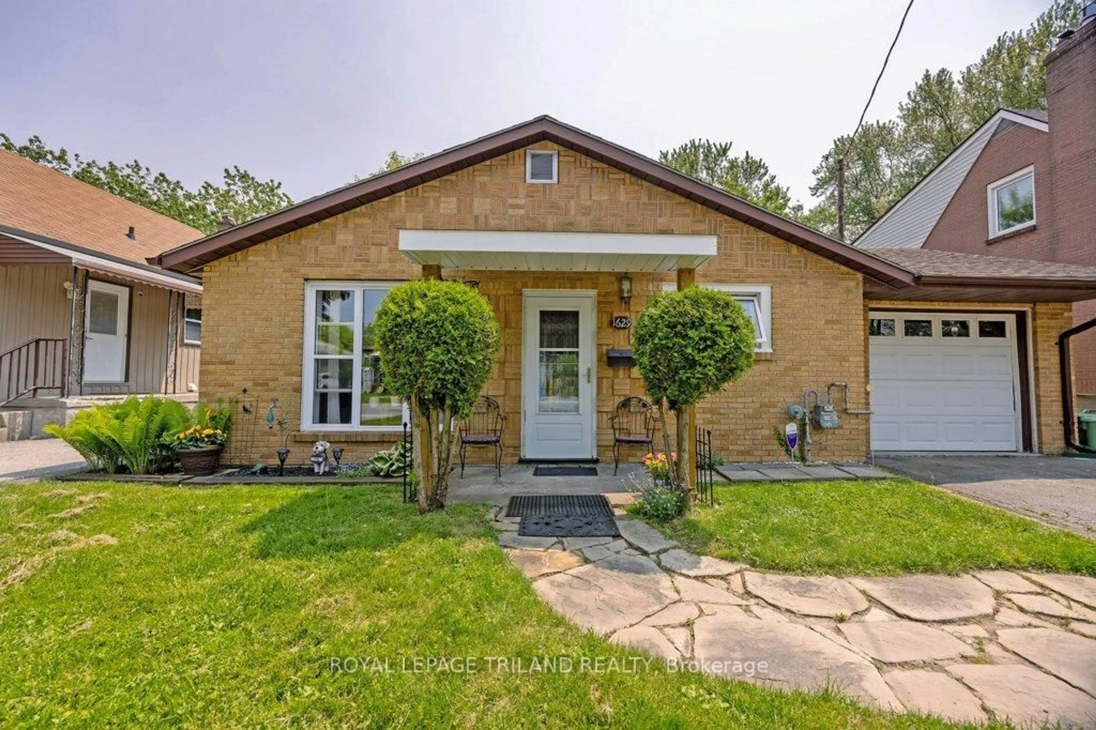 Home with brick exterior material, street for 1629 Churchill Ave, London East Ontario N5W 2L1