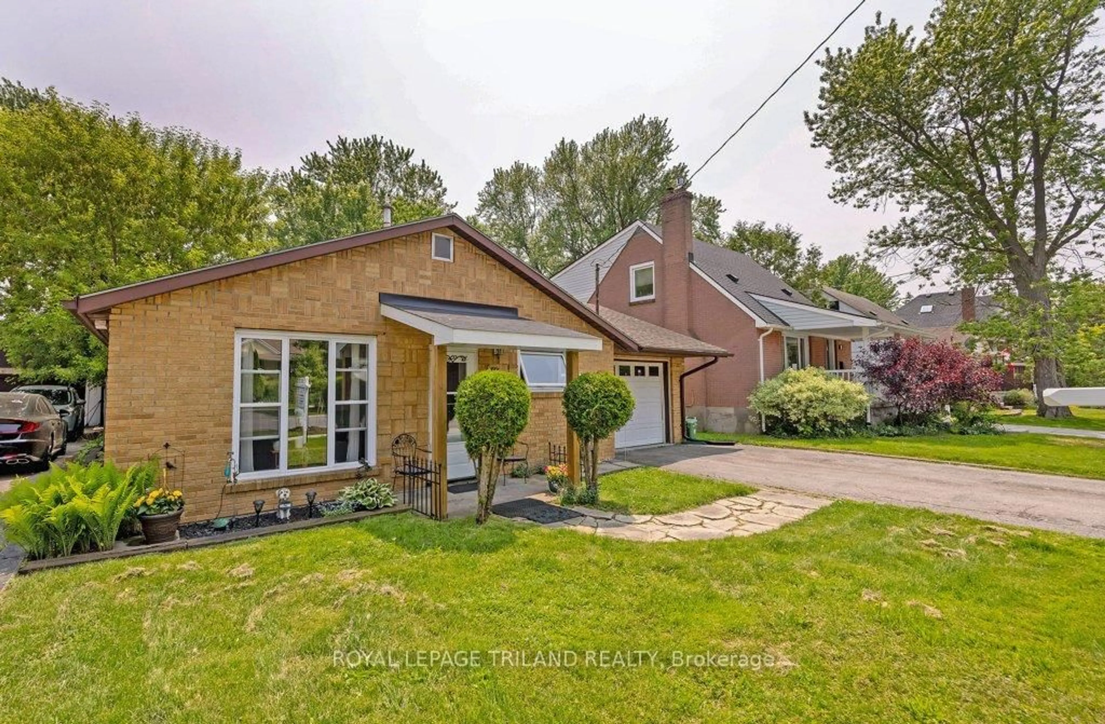 Home with brick exterior material, street for 1629 Churchill Ave, London East Ontario N5W 2L1