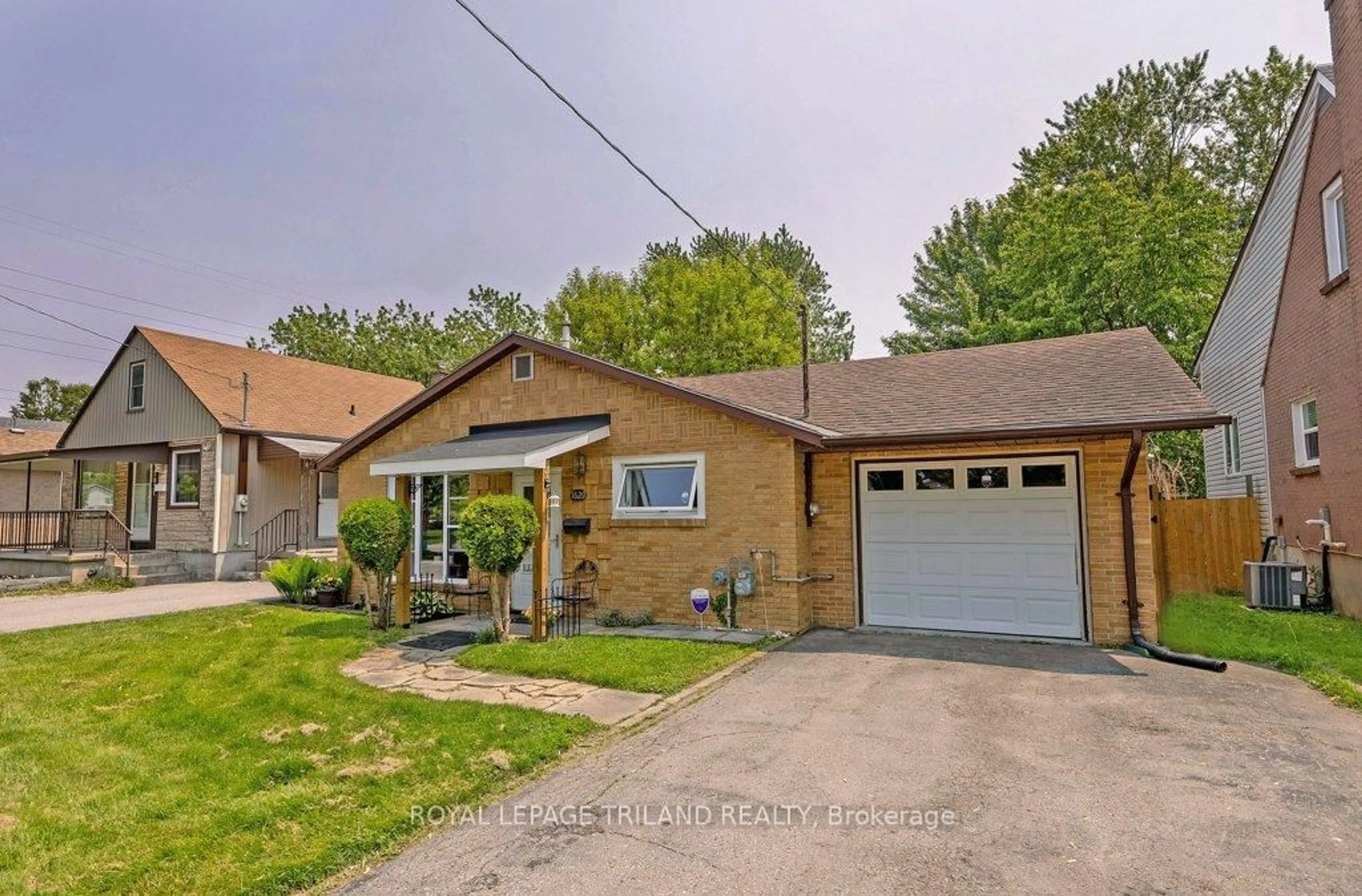 Home with brick exterior material, street for 1629 Churchill Ave, London East Ontario N5W 2L1