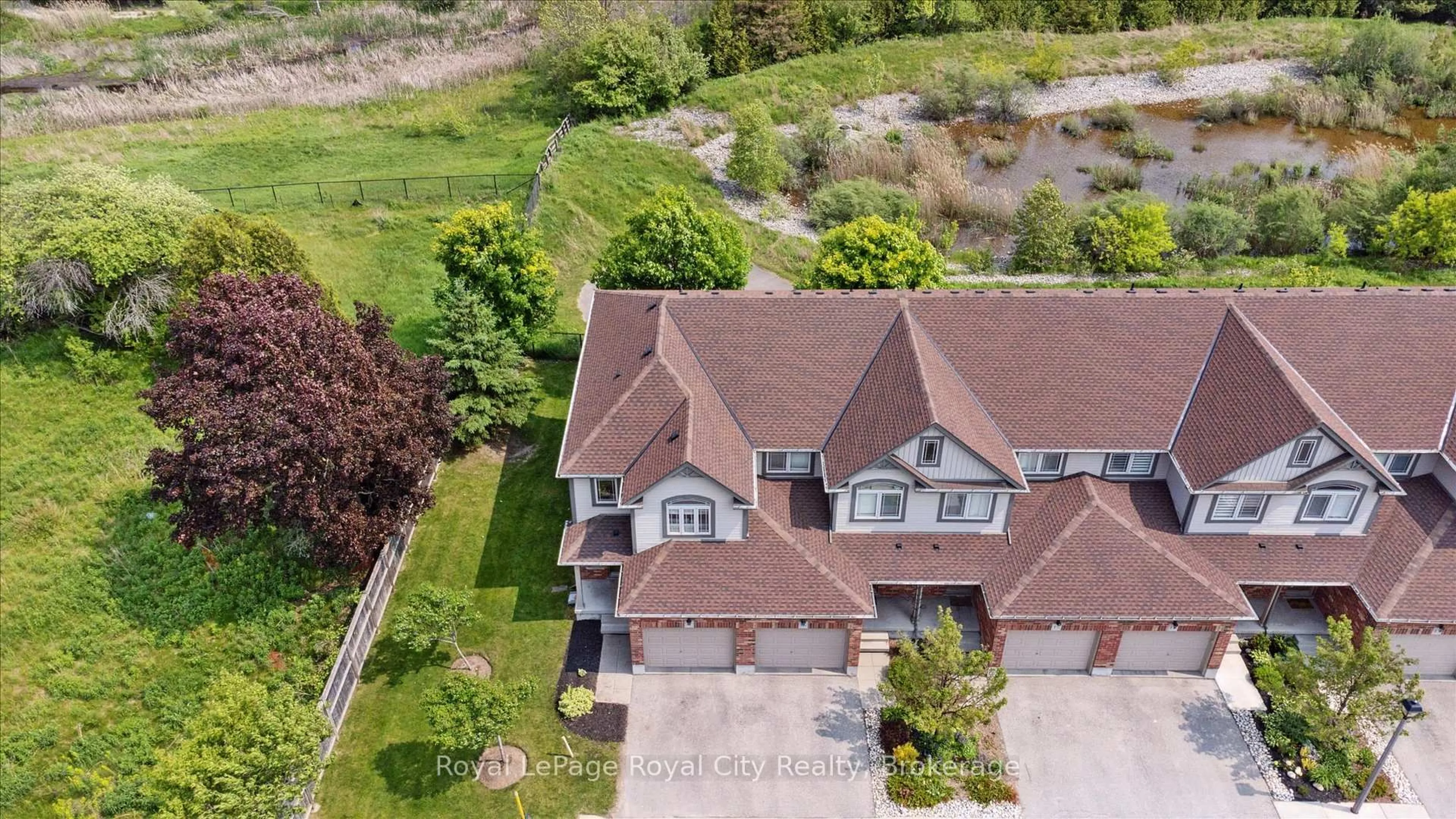A pic from outside/outdoor area/front of a property/back of a property/a pic from drone, unknown for 355 Macalister Blvd #17, Guelph Ontario N1L 1B3