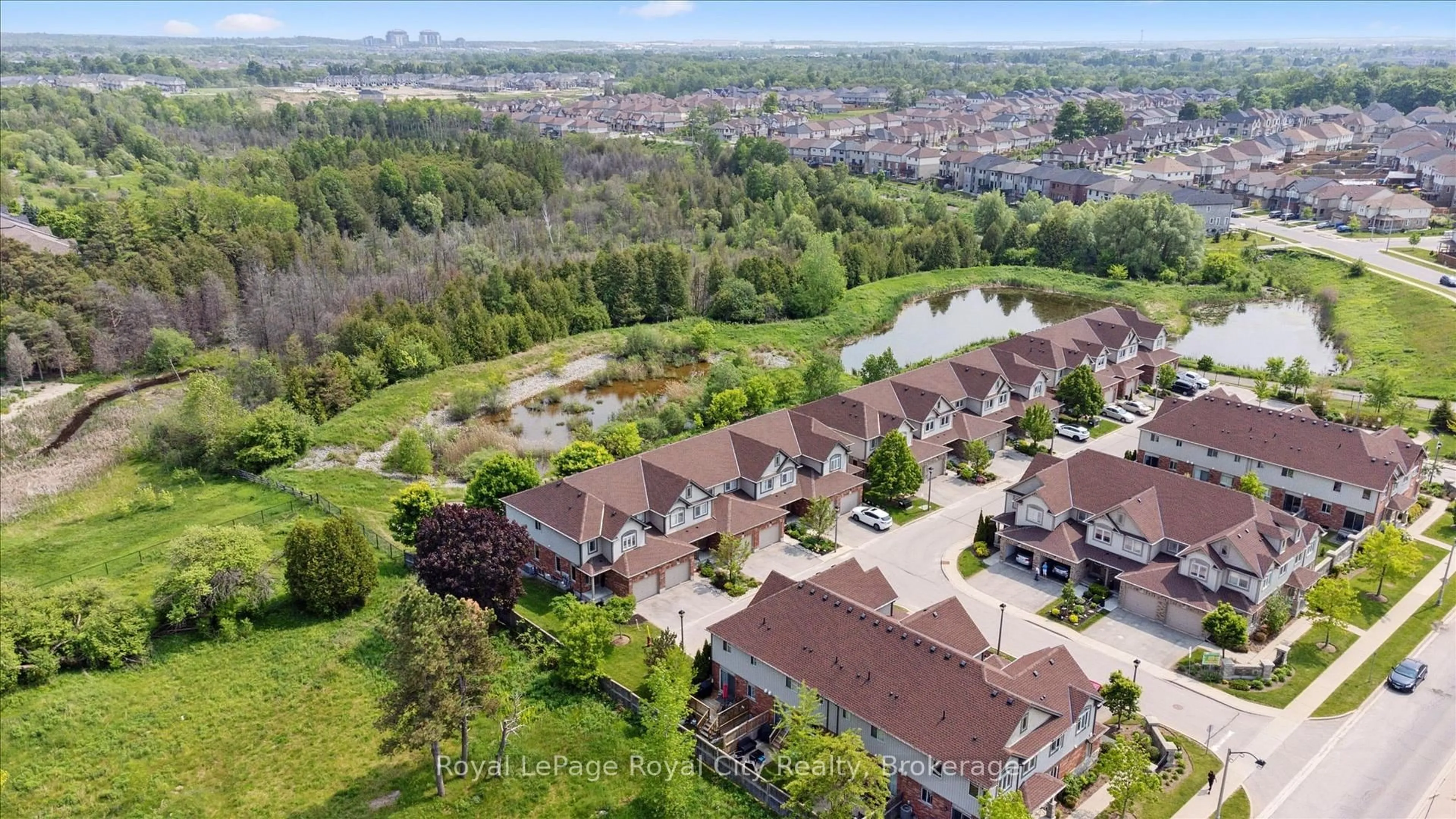 A pic from outside/outdoor area/front of a property/back of a property/a pic from drone, unknown for 355 Macalister Blvd #17, Guelph Ontario N1L 1B3