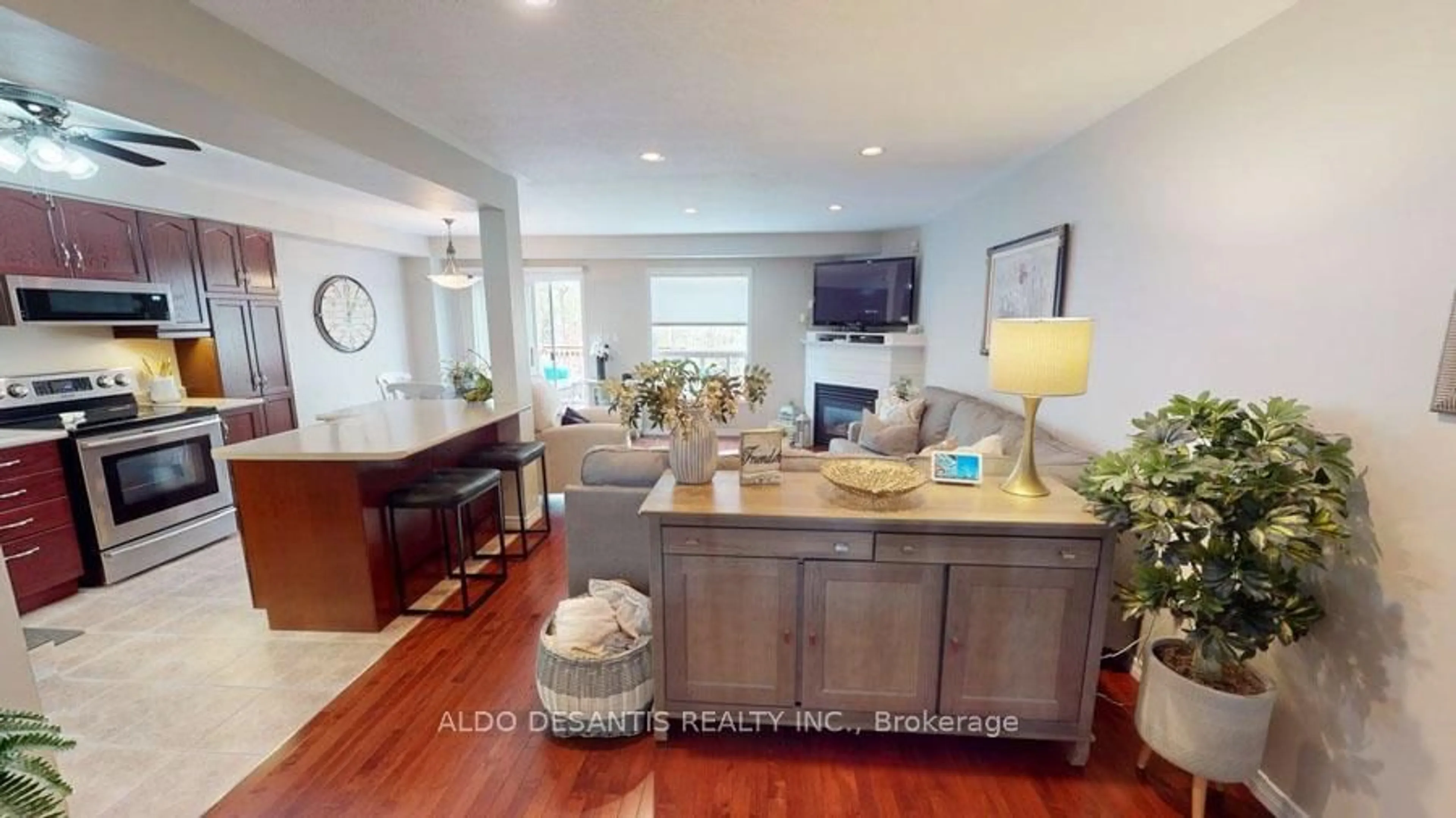 Living room with furniture, wood/laminate floor for 348 Highland Rd #3, Hamilton Ontario L8J 3W5