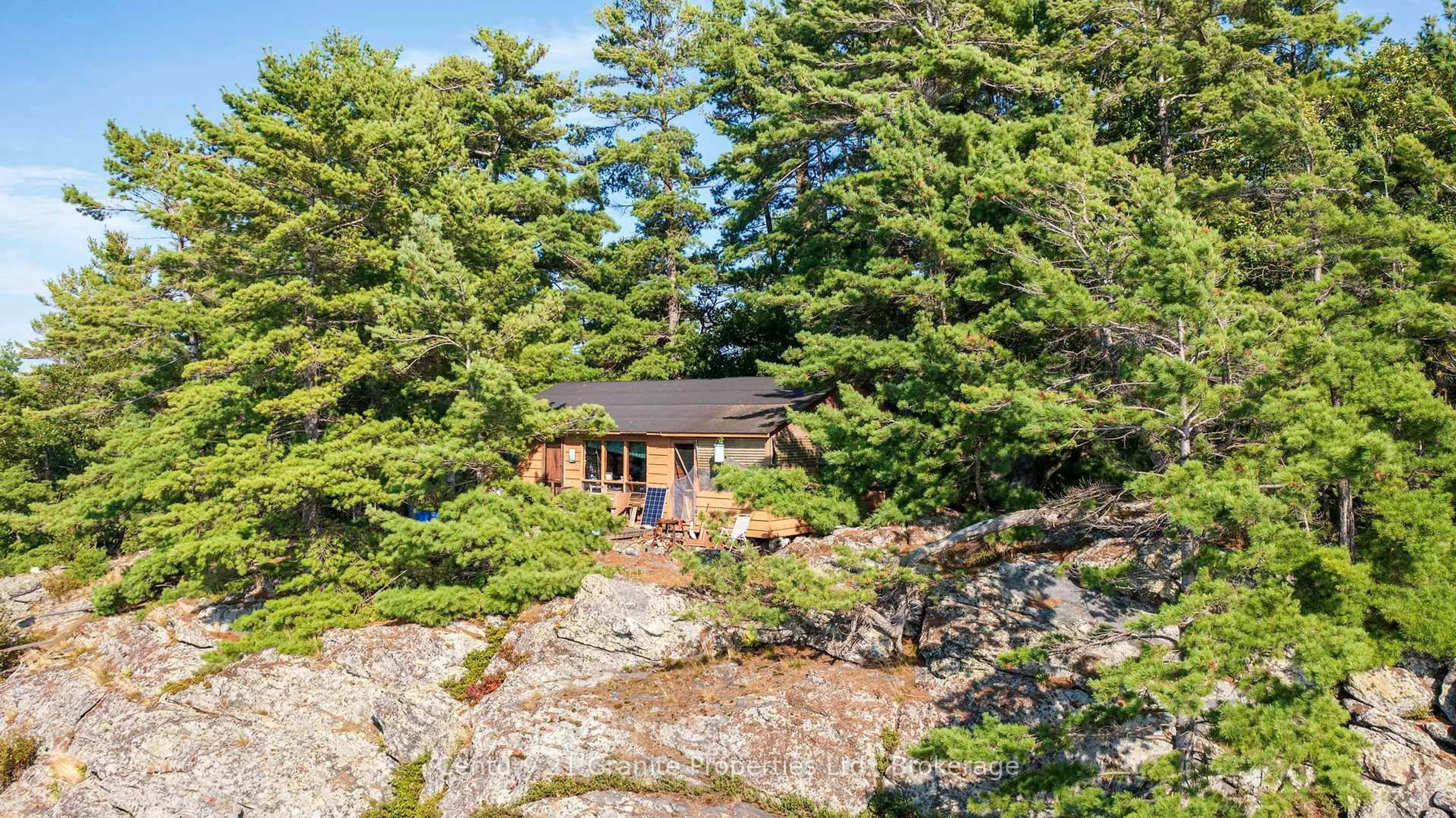 A pic from outside/outdoor area/front of a property/back of a property/a pic from drone, forest/trees view for 1 PARTRIDGE ISLAND, McDougall Ontario P0G 1G0