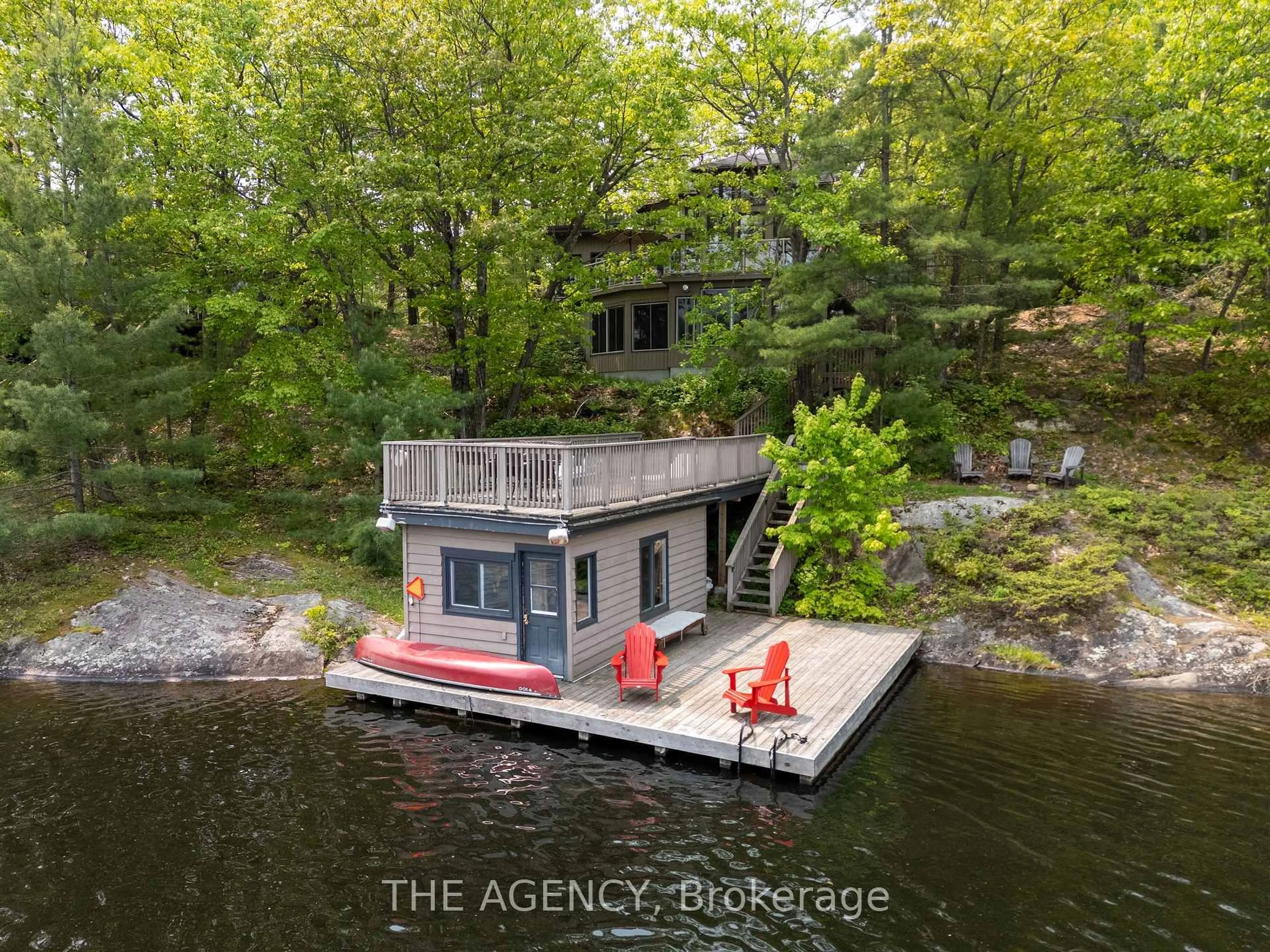 A pic from outside/outdoor area/front of a property/back of a property/a pic from drone, water/lake/river/ocean view for 45 Pinetree Rd, Gravenhurst Ontario P1P 1R2