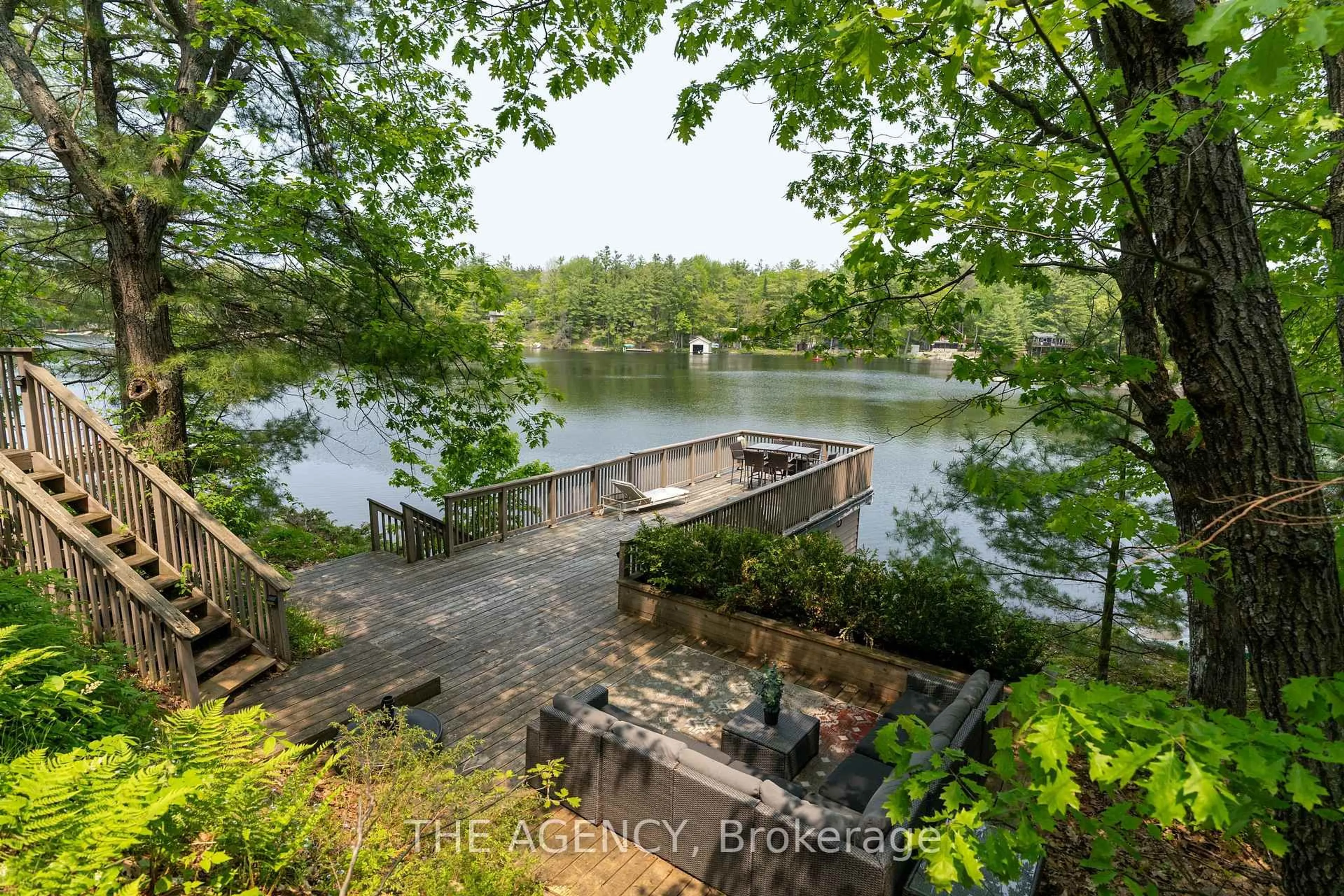A pic from outside/outdoor area/front of a property/back of a property/a pic from drone, water/lake/river/ocean view for 45 Pinetree Rd, Gravenhurst Ontario P1P 1R2