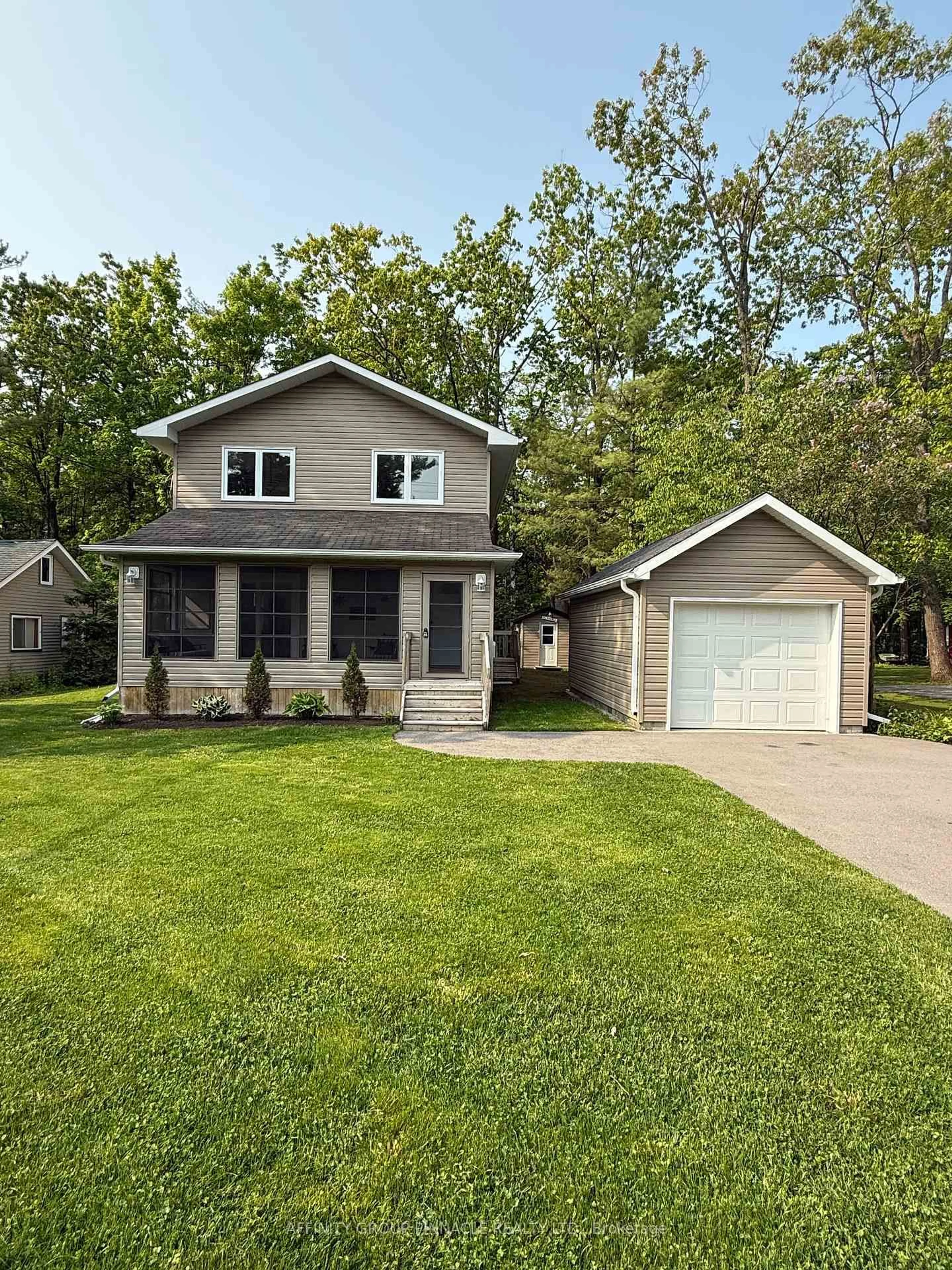 Home with vinyl exterior material, street for 34 Pleasant View Dr, Kawartha Lakes Ontario K0M 1N0