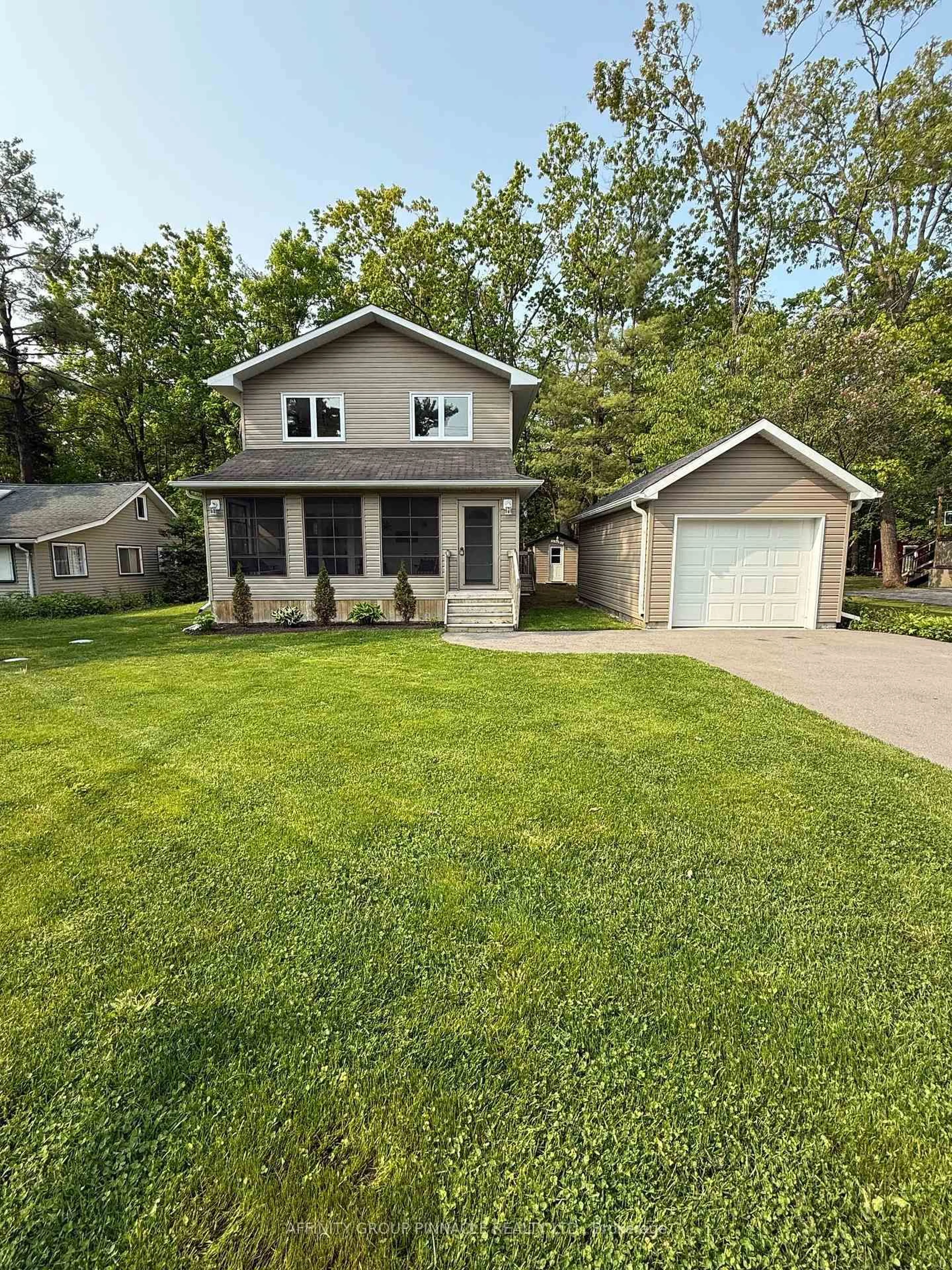 Home with vinyl exterior material, street for 34 Pleasant View Dr, Kawartha Lakes Ontario K0M 1N0