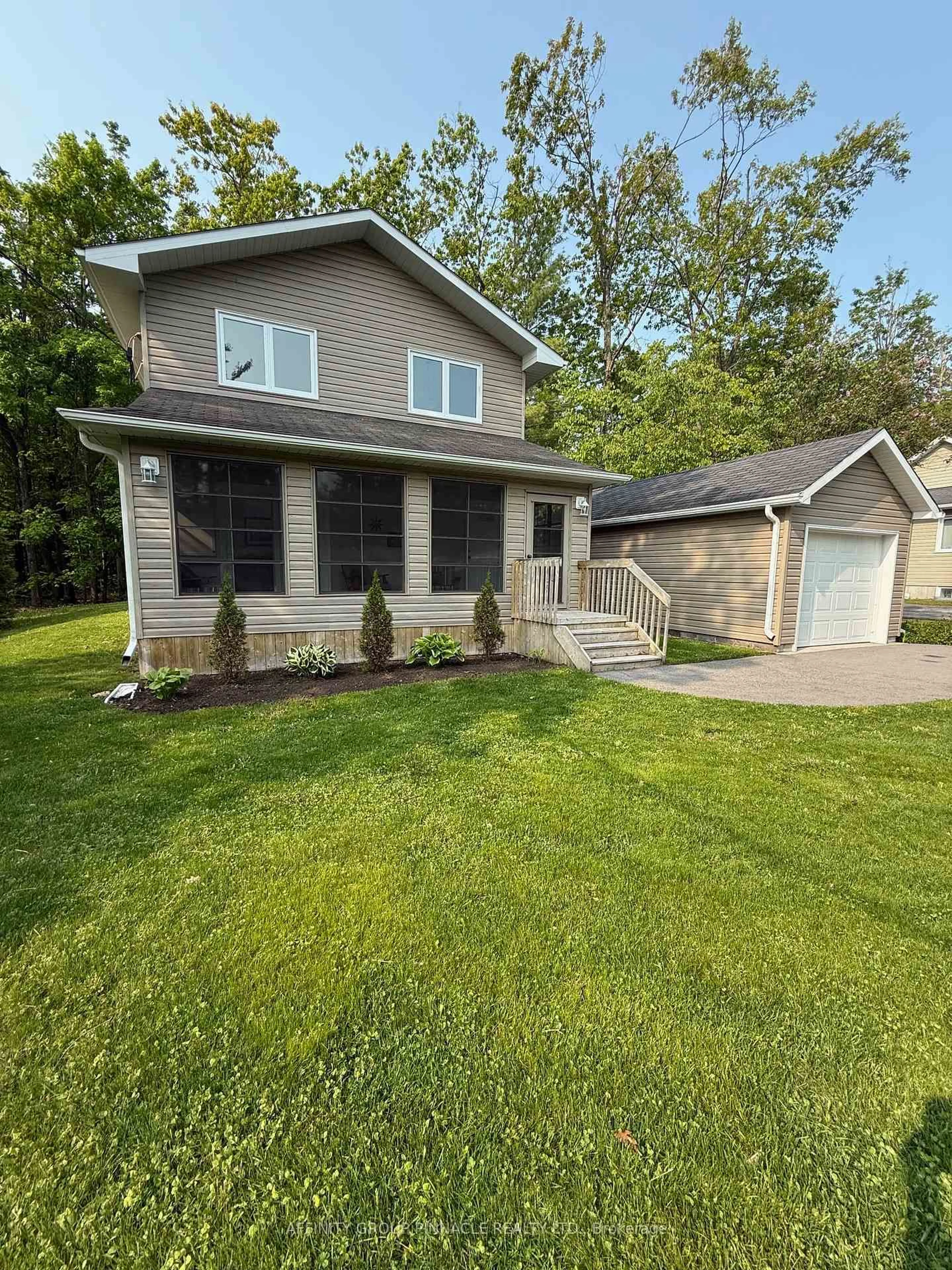 Home with vinyl exterior material, street for 34 Pleasant View Dr, Kawartha Lakes Ontario K0M 1N0